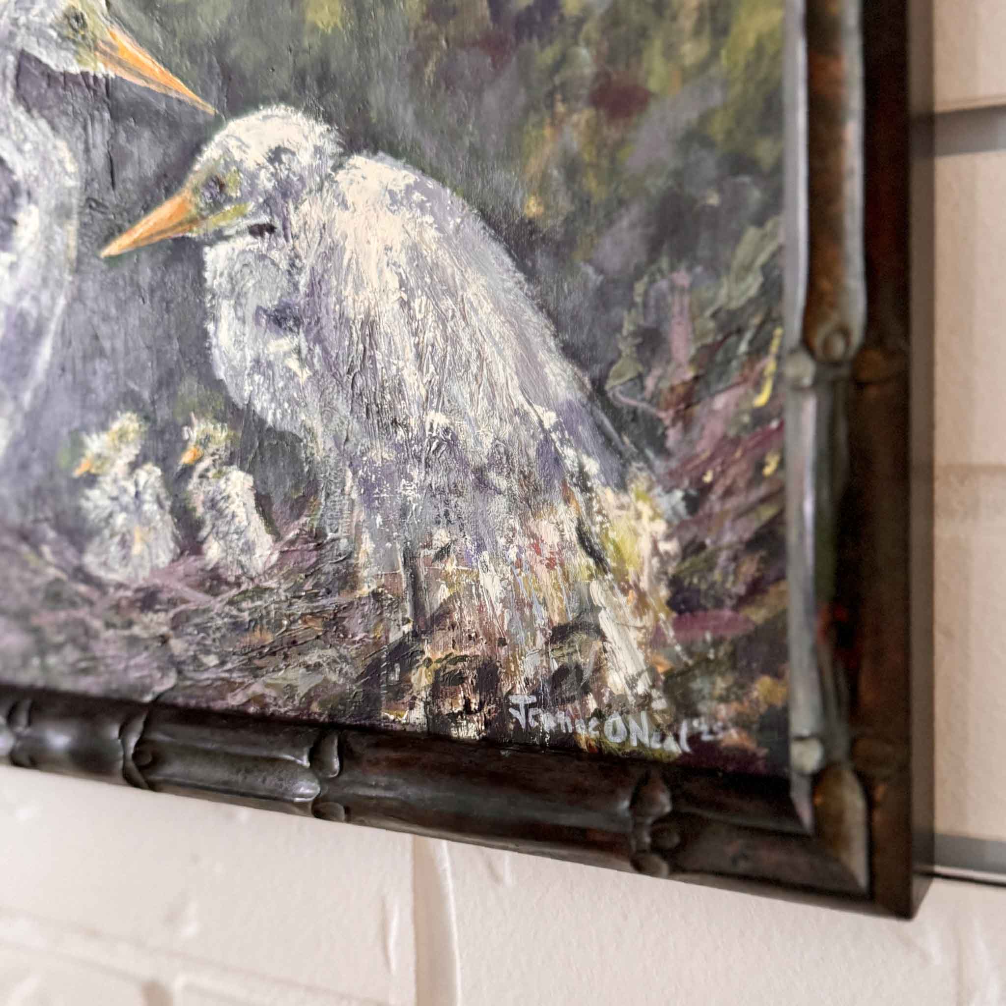 Original oil painting “Party of Five” by Jeanne O’Neal featuring five white egrets in a nest against a green background, framed and displayed on a wall.