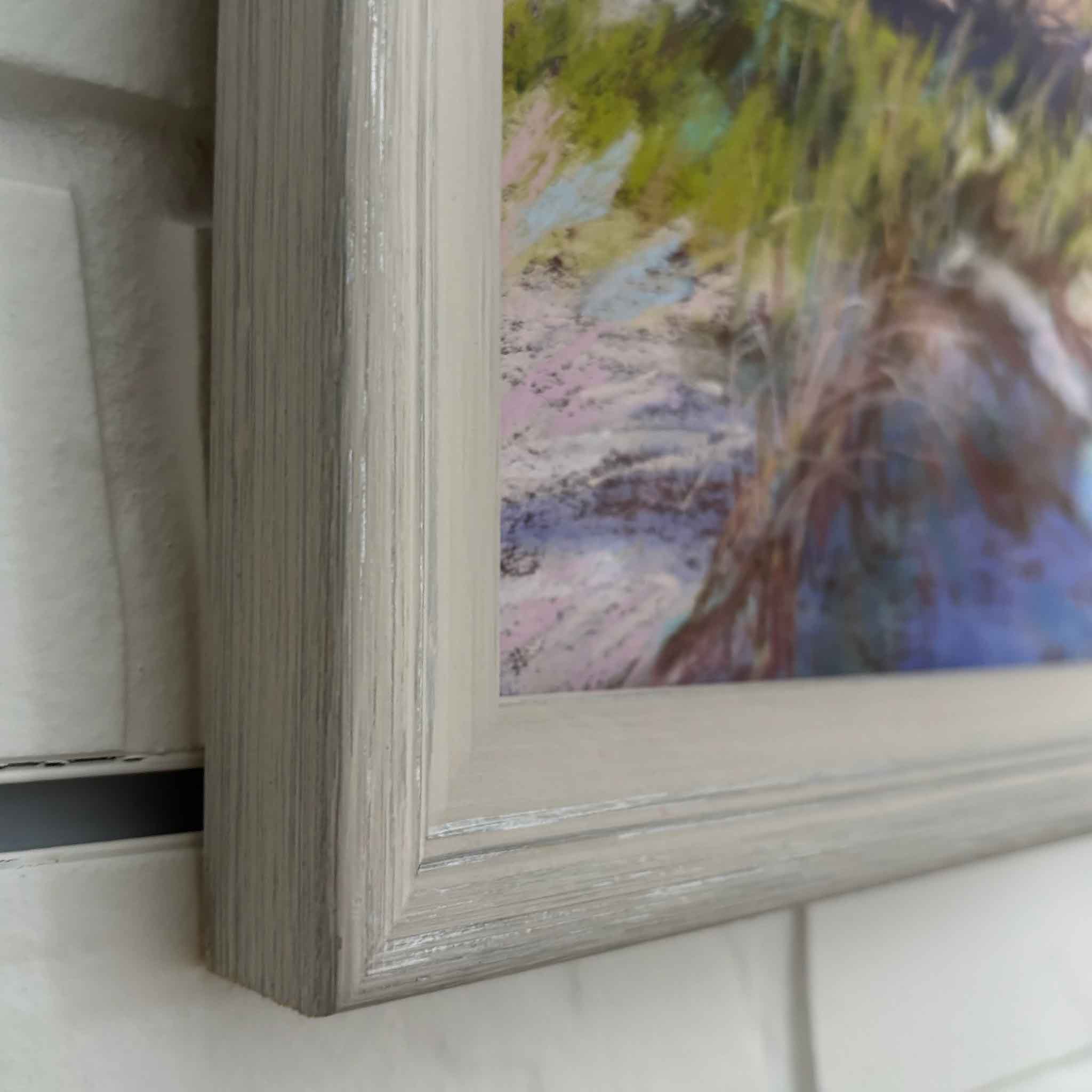 Original pastel painting A Closer Look by Joanne Willoughby featuring windswept beach grasses and dunes, framed in gray wood.