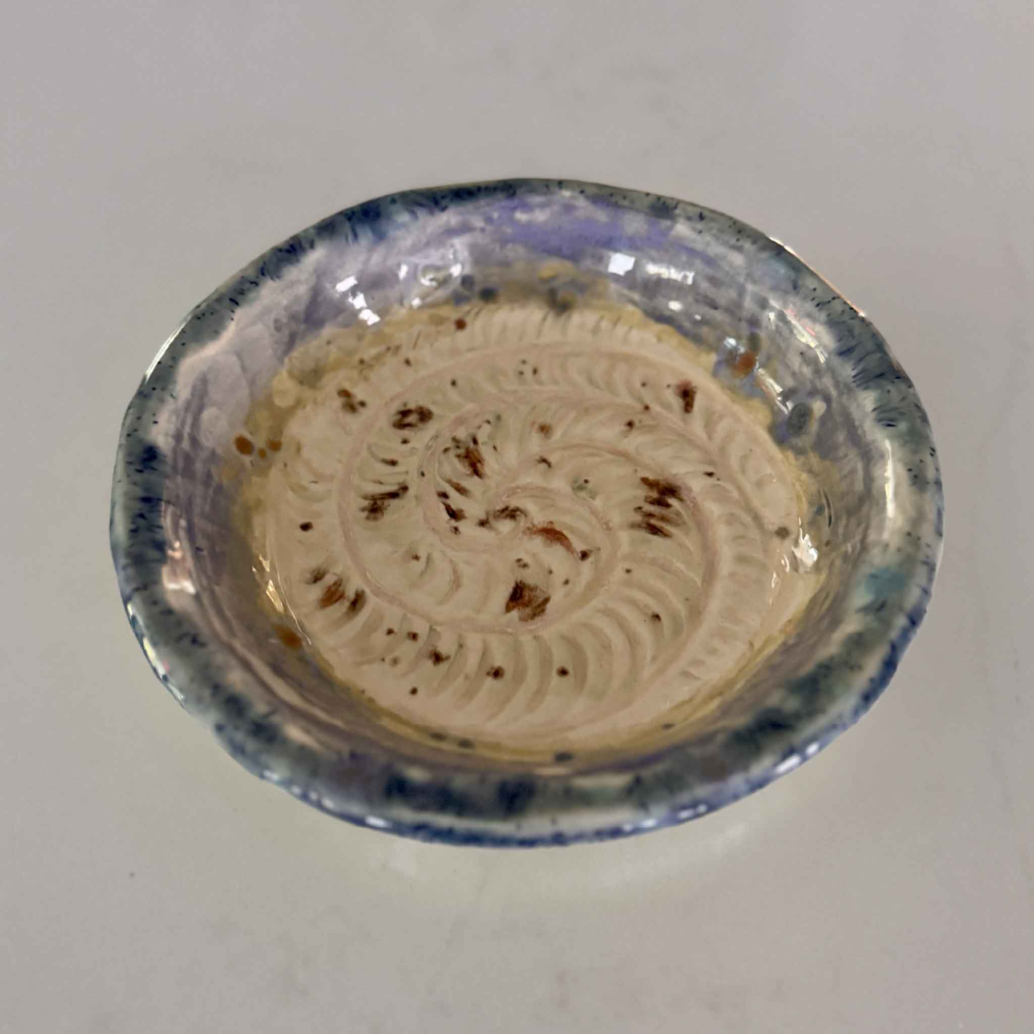 hand made ceramic plate with a textured design on made by local potter in Pawleys Island
