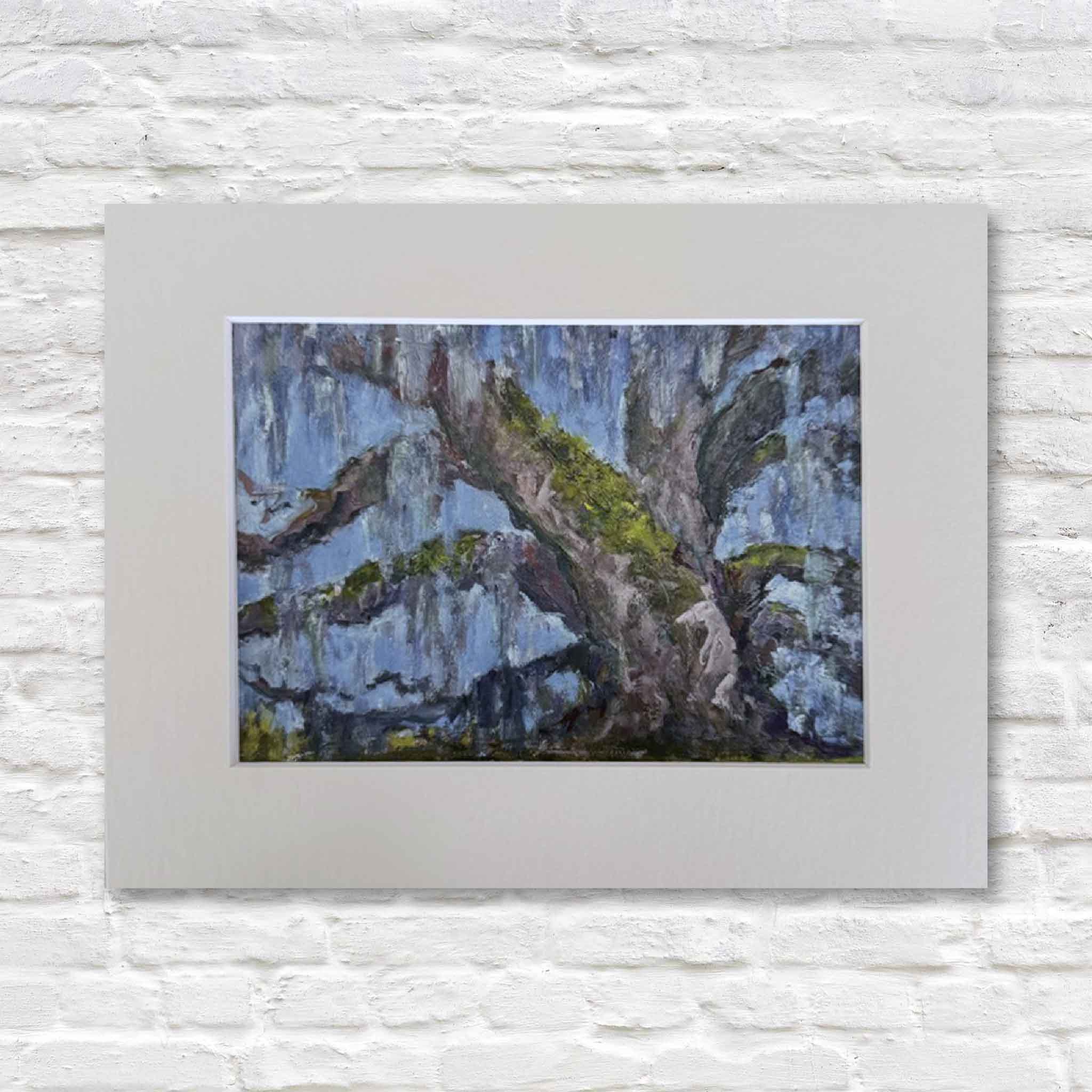 Enduring Grace giclée print by Jeanne O’Neal featuring a Southern live oak tree with Spanish moss and blue sky, Lowcountry landscape from the Among the Trees collection at Gray Man Gallery Pawleys Island SC