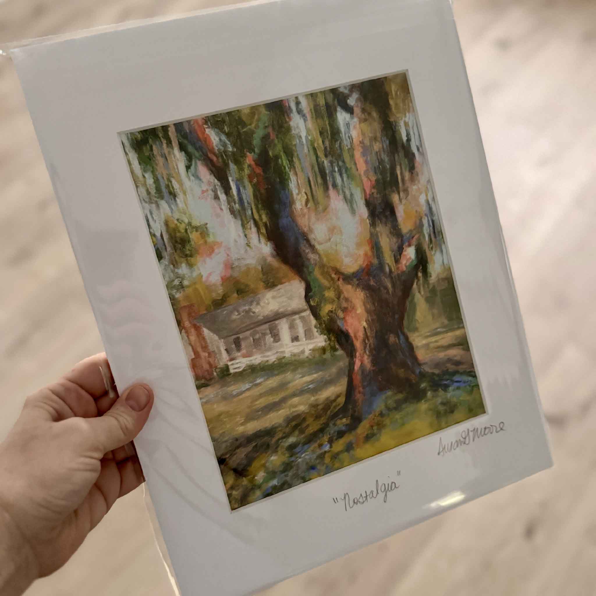 11x14 matted giclée print Nostalgia by Susan Moore, featuring a moss-draped live oak and Southern cottage bathed in warm, impressionistic light.