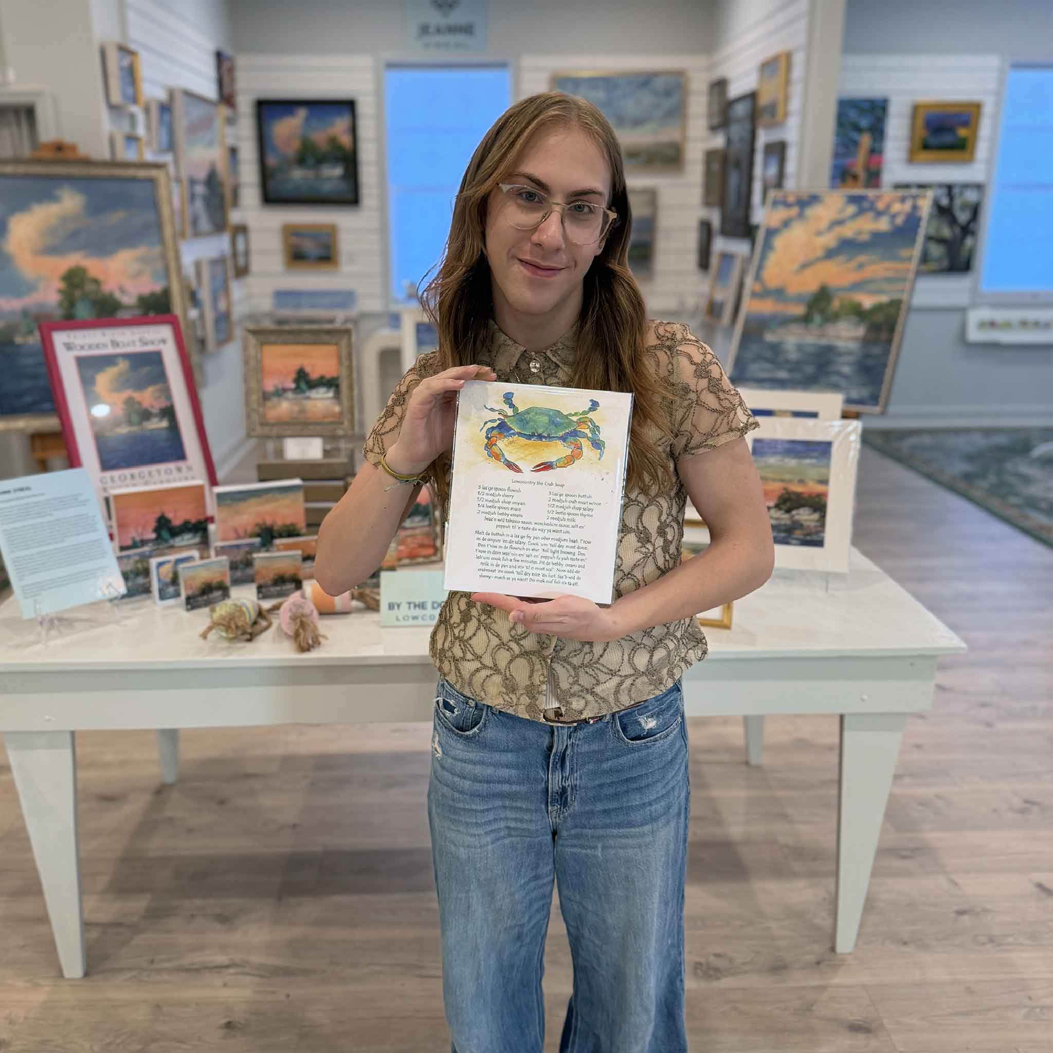 Illustrated Lowcountry she-crab soup recipe print by Vida Miller with watercolor blue crab, unframed 8x10 artwork ready for standard frames. Pictured at Gray Man Gallery.