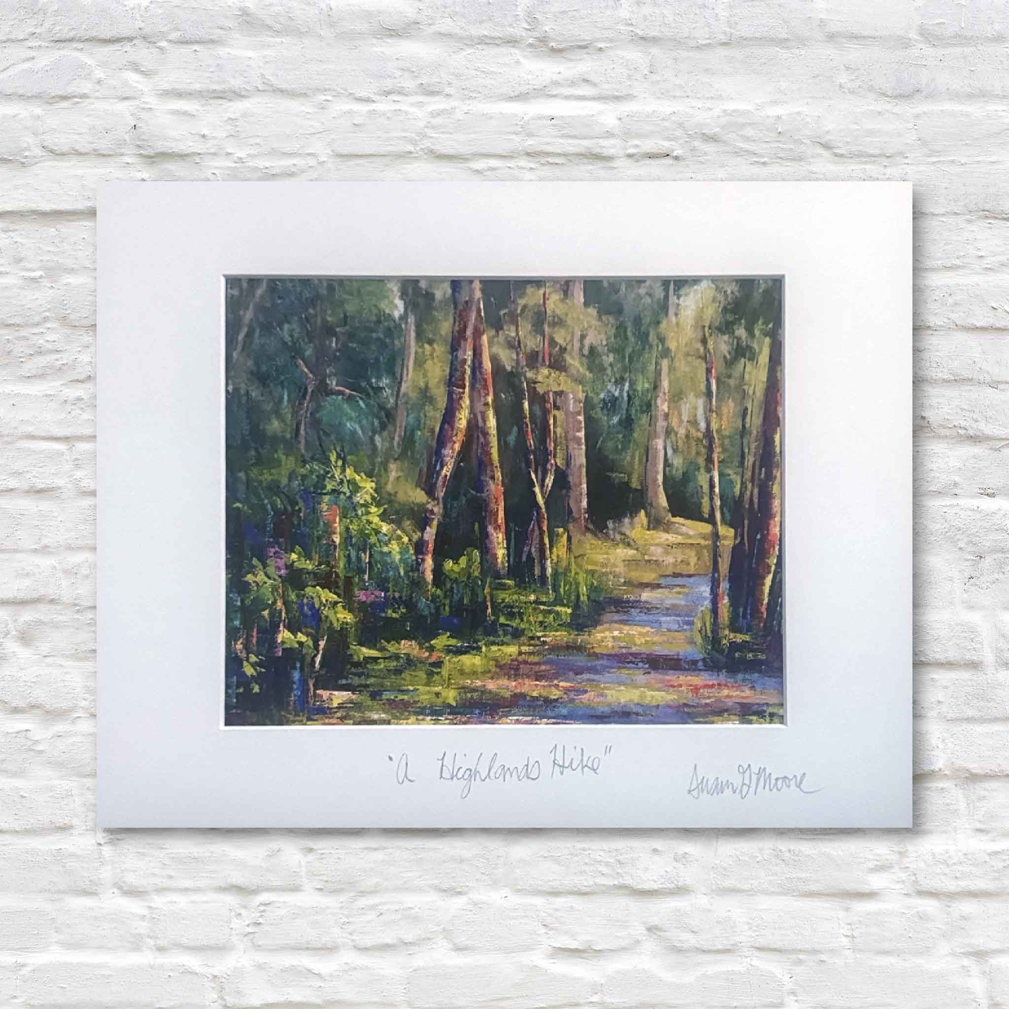 Fine art giclée print “A Highlands Hike” by local artist Susan Moore, professionally matted 11x14 woodland trail artwork displayed at Gray Man Gallery in Pawleys Island South Carolina