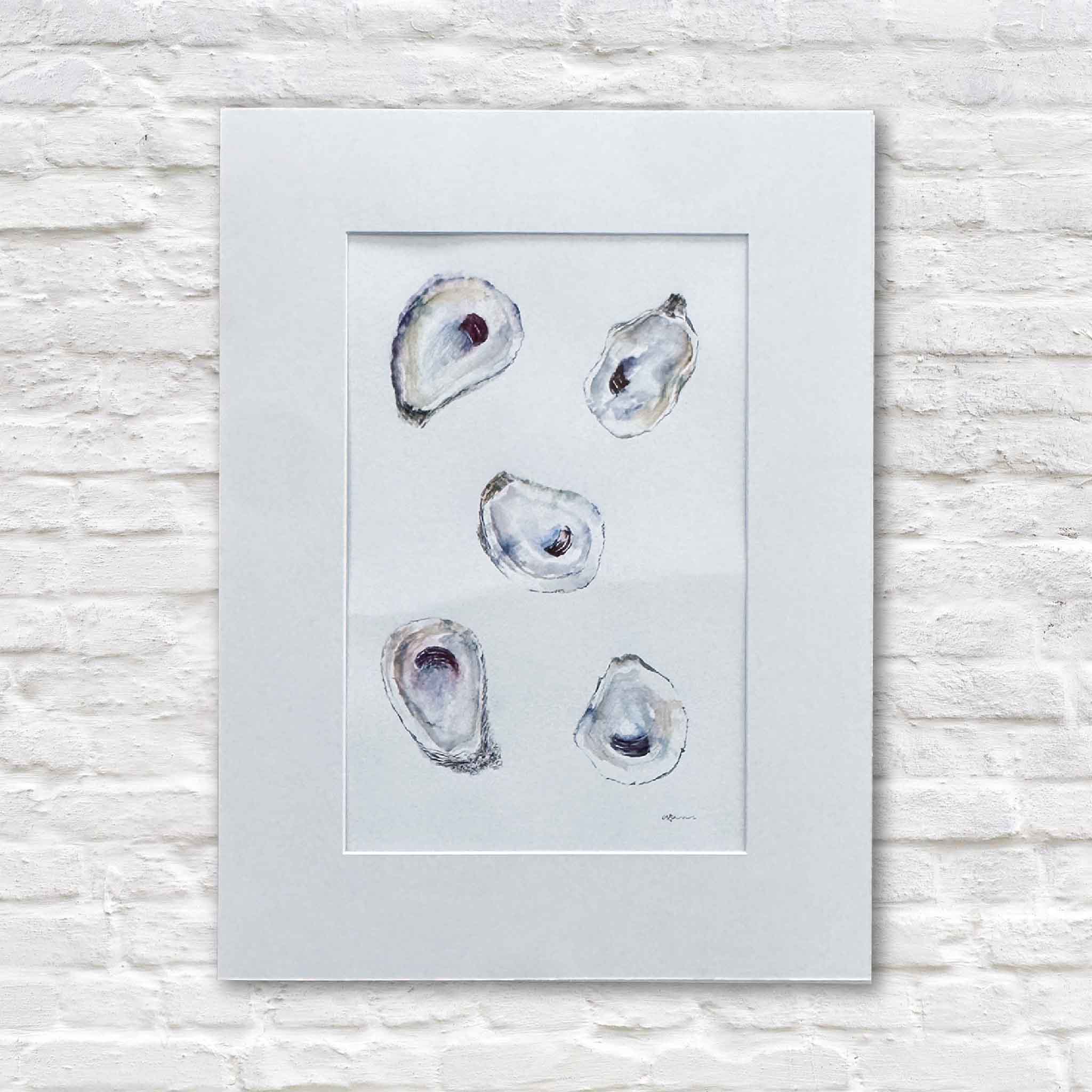 Original watercolor painting of five oyster shells by Allison Farr, matted to 18x24 and displayed against a white brick wall.