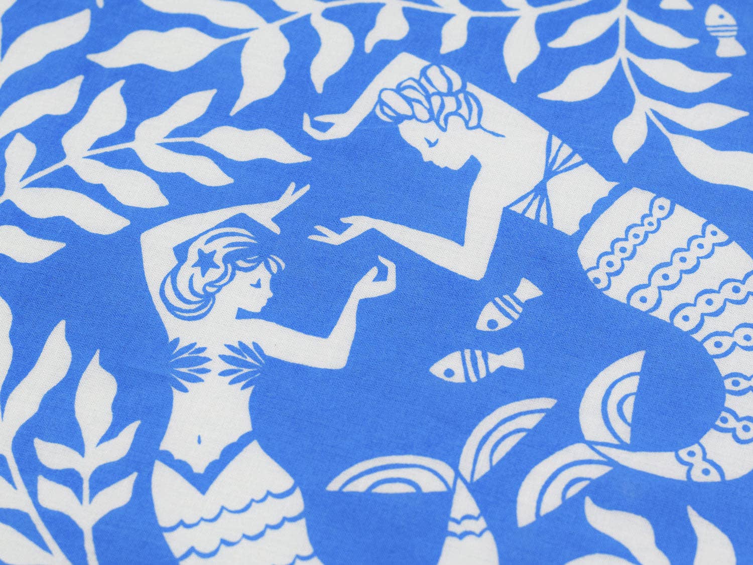 Detailed view of the Cerulean Mermaid organic cotton bandana highlighting intricate underwater artwork with mermaids, seaweed, and marine life printed on soft GOTS-certified organic cotton, available at Gray Man Gallery in Pawleys Island.