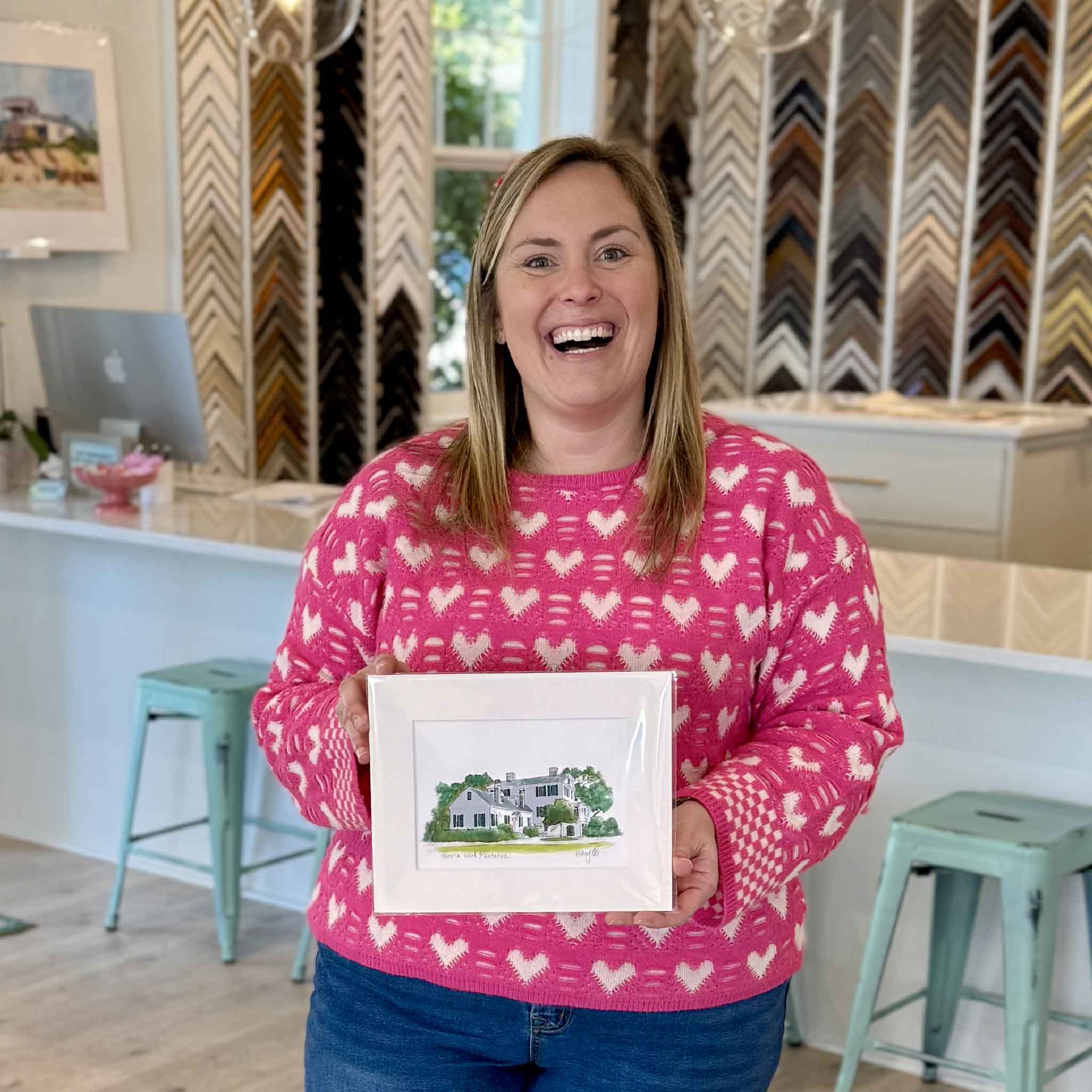 Gray Man Gallery team member holding Chicora Wood Plantation fine art print by a local artist , matted to fit standard 8x10 frame and available exclusively at Gray Man Gallery in Pawleys Island South Carolina