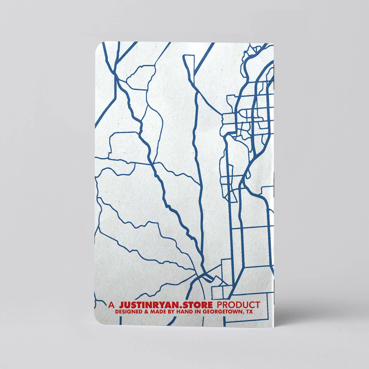 Back cover of the Daytrip Log Book set, a pocket-sized travel journal for recording destinations, road trips, local attractions, favorite restaurants, and memorable adventures. Available at Gray Man Gallery in Pawleys Island.