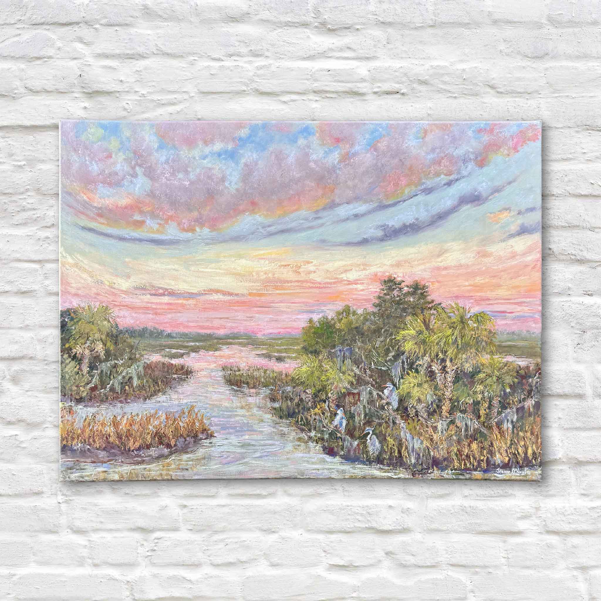 Original 40x30 oil painting “Evening Companions” by local artist Jeanne O’Neal showing a Lowcountry marsh at sunset with herons, available at Gray Man Gallery in Pawleys Island