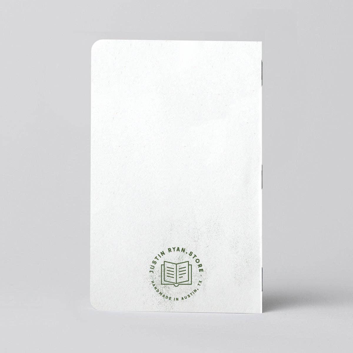 Back cover of the Fishing Log Book journal set. Compact fishing trip tracker designed for recording catches, fishing conditions, bait selections, and memorable days on the water. Available at Gray Man Gallery in Pawleys Island.