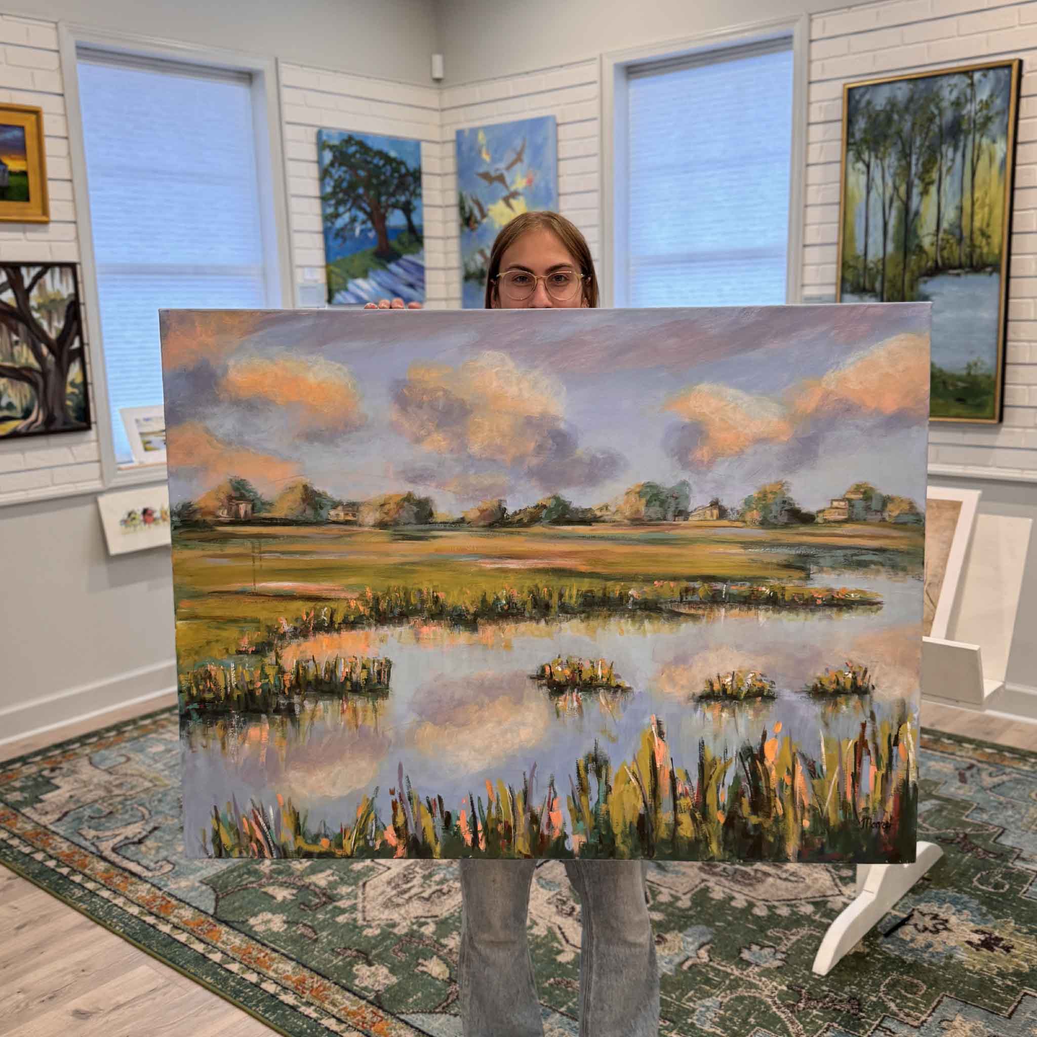 Golden Hour Reflections by local artist Susan Moore, original acrylic painting shown in Gray Man Gallery in Pawleys Island, SC, photographed in gallery for scale