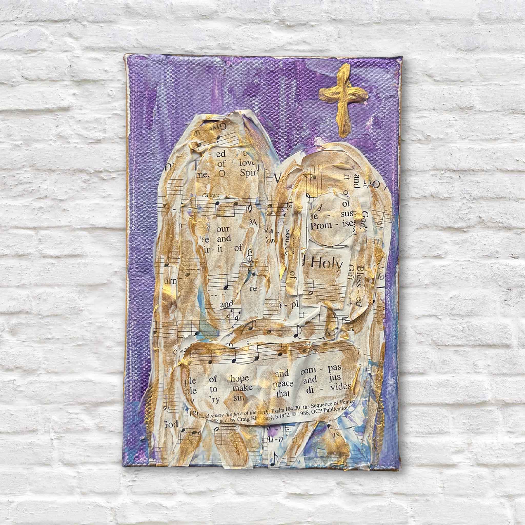 front view of Jeanne O’Neal original mixed-media Christmas artwork featuring layered hymn sheet music and gold cross