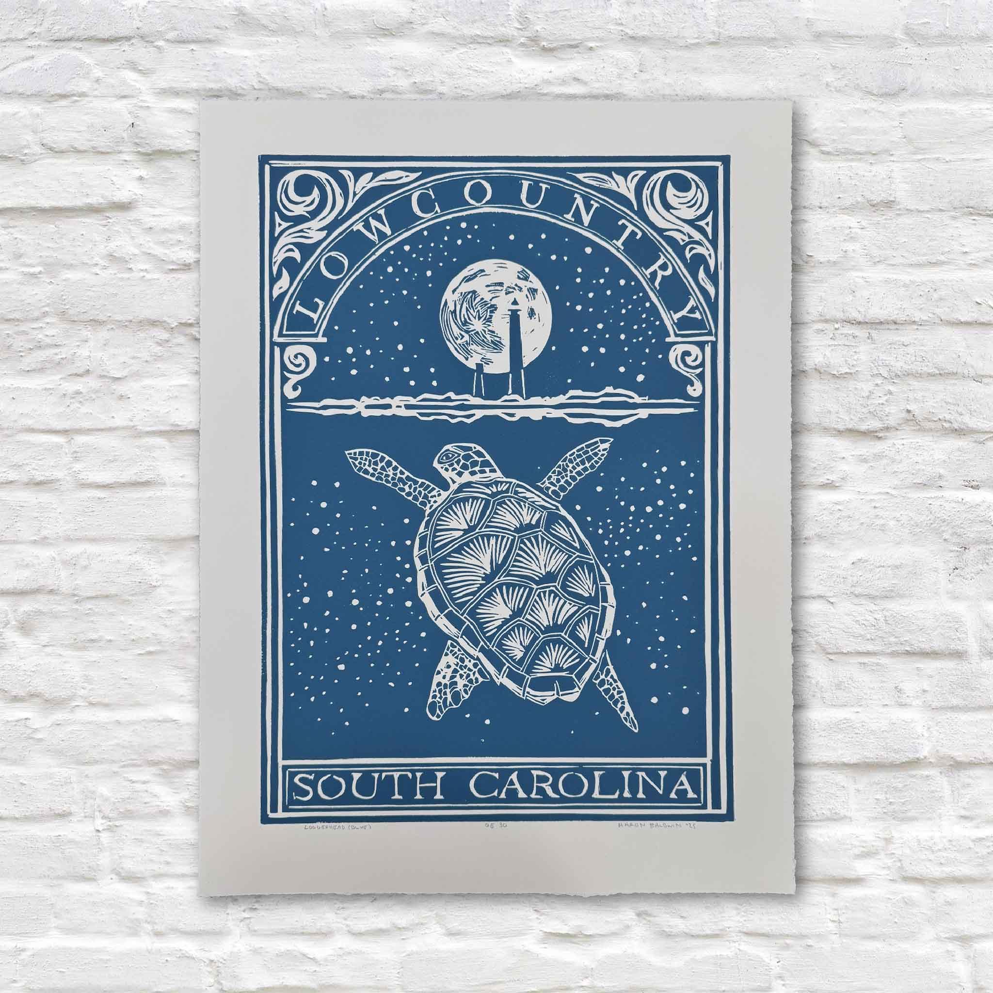 Original linocut titled Loggerhead by Aaron Baldwin, featuring a sea turtle swimming beneath a moonlit Lowcountry South Carolina sky.