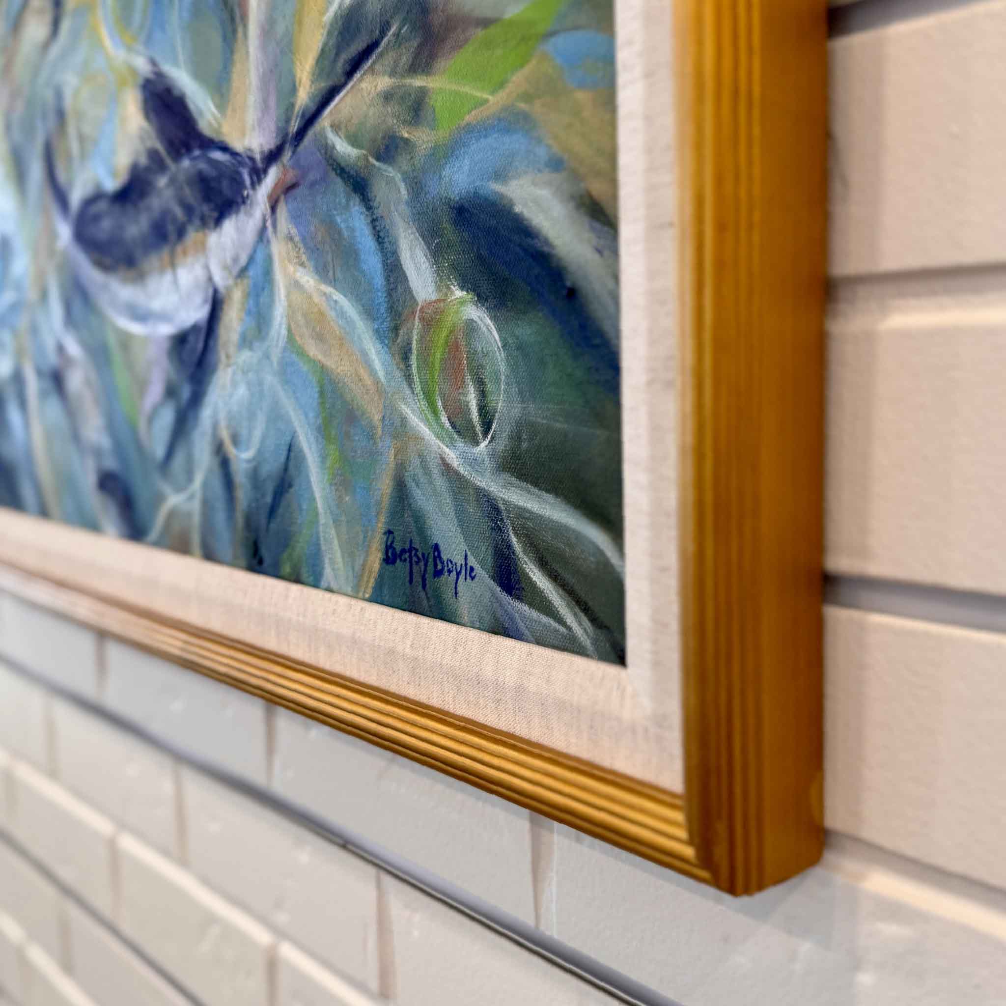 Detail view of Circling by Betsy Boyle, highlighting expressive oil brushwork, dynamic movement, the artist’s signature, and custom framing by Gray Man Gallery.