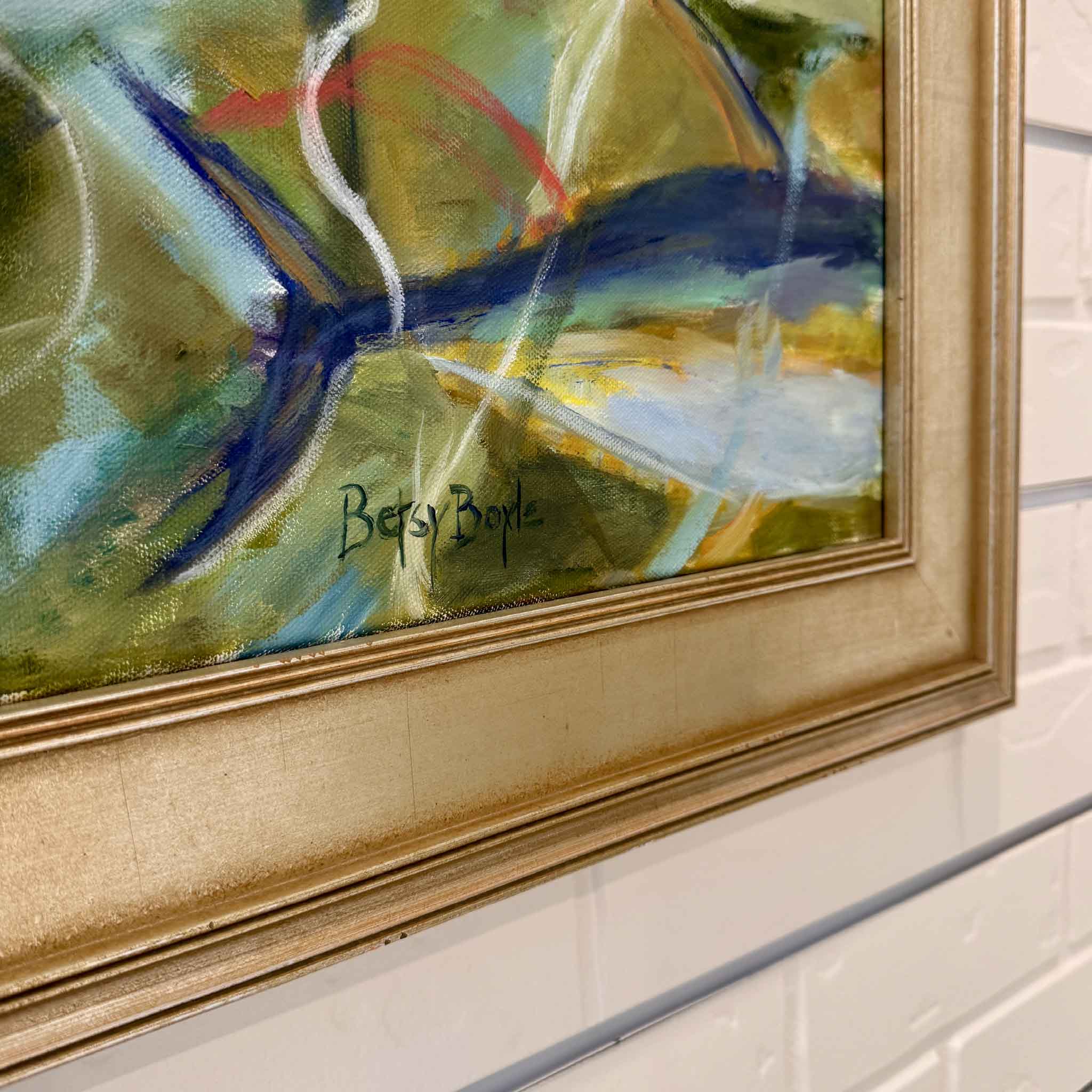 Detail view of Fishing Lines Galore by Betsy Boyle, highlighting expressive brushwork, layered color, the artist’s signature, and custom framing by Gray Man Gallery.