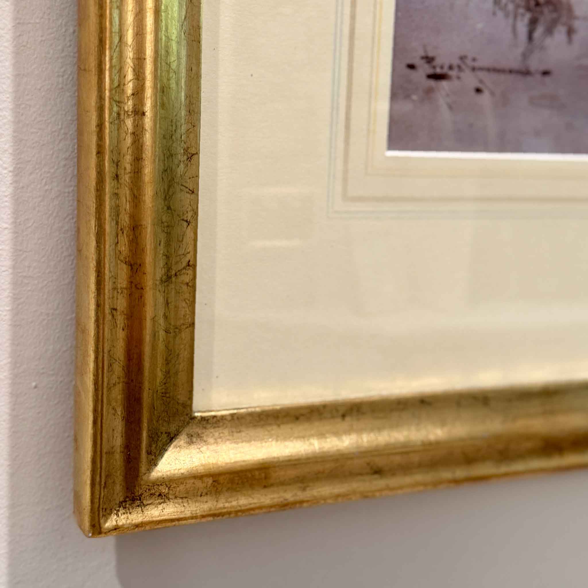 Detail view of Holding the Light by Charles Eyres Simmons showing the gold-leafed frame, French mat, and delicate watercolor technique.