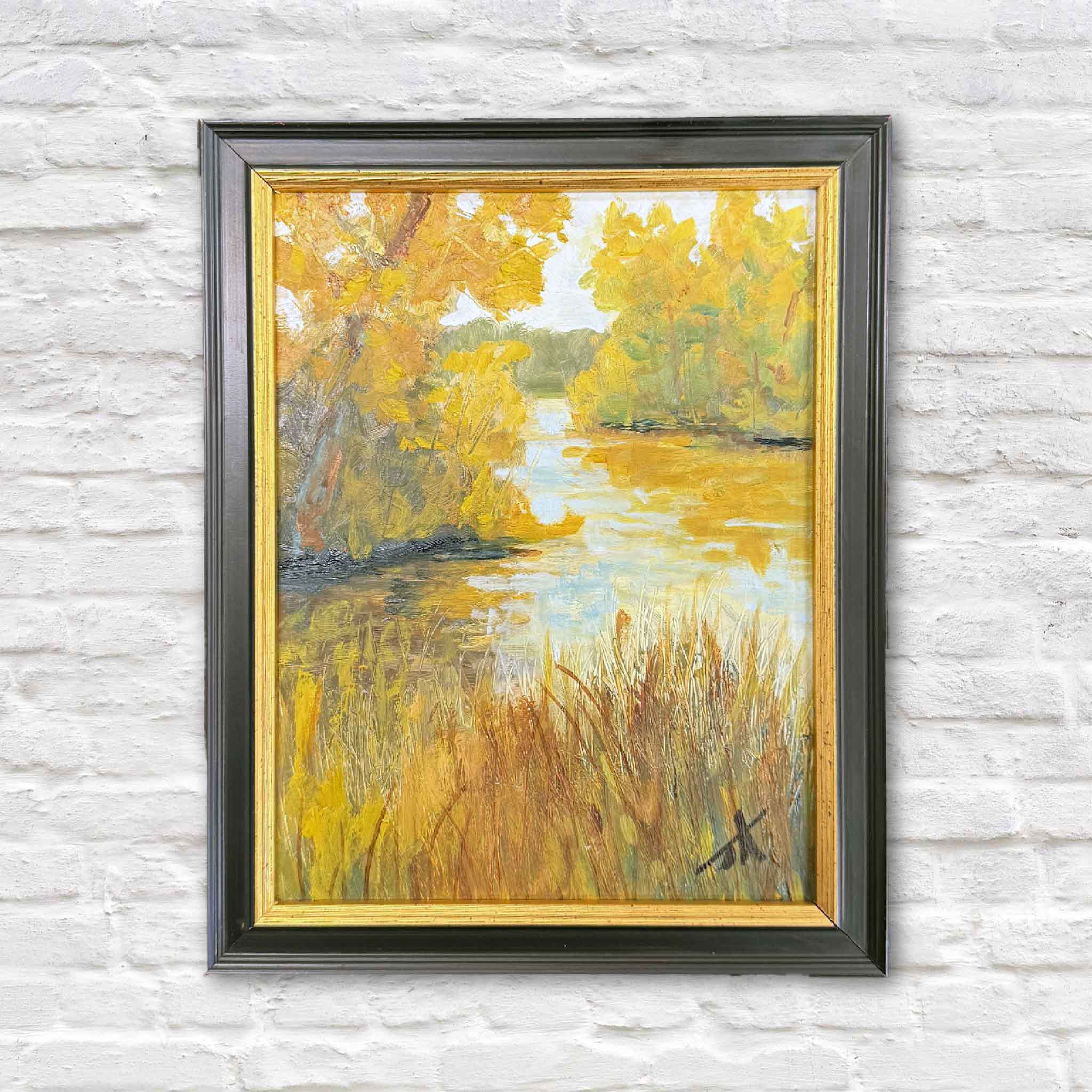 Original oil painting Along the Quiet Water by Jamie Arnold, featuring a sunlit Lowcountry waterway with golden marsh grasses and calm reflections, framed and ready to hang.