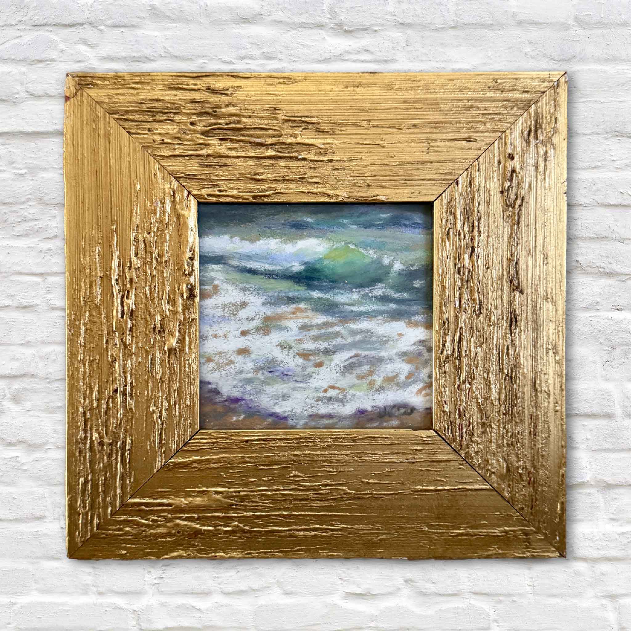 Sparkle is a 4x4 original pastel by Joanne Willoughby, depicting shimmering coastal water in soft blues, greens, and white, framed in a rustic gold wood frame.