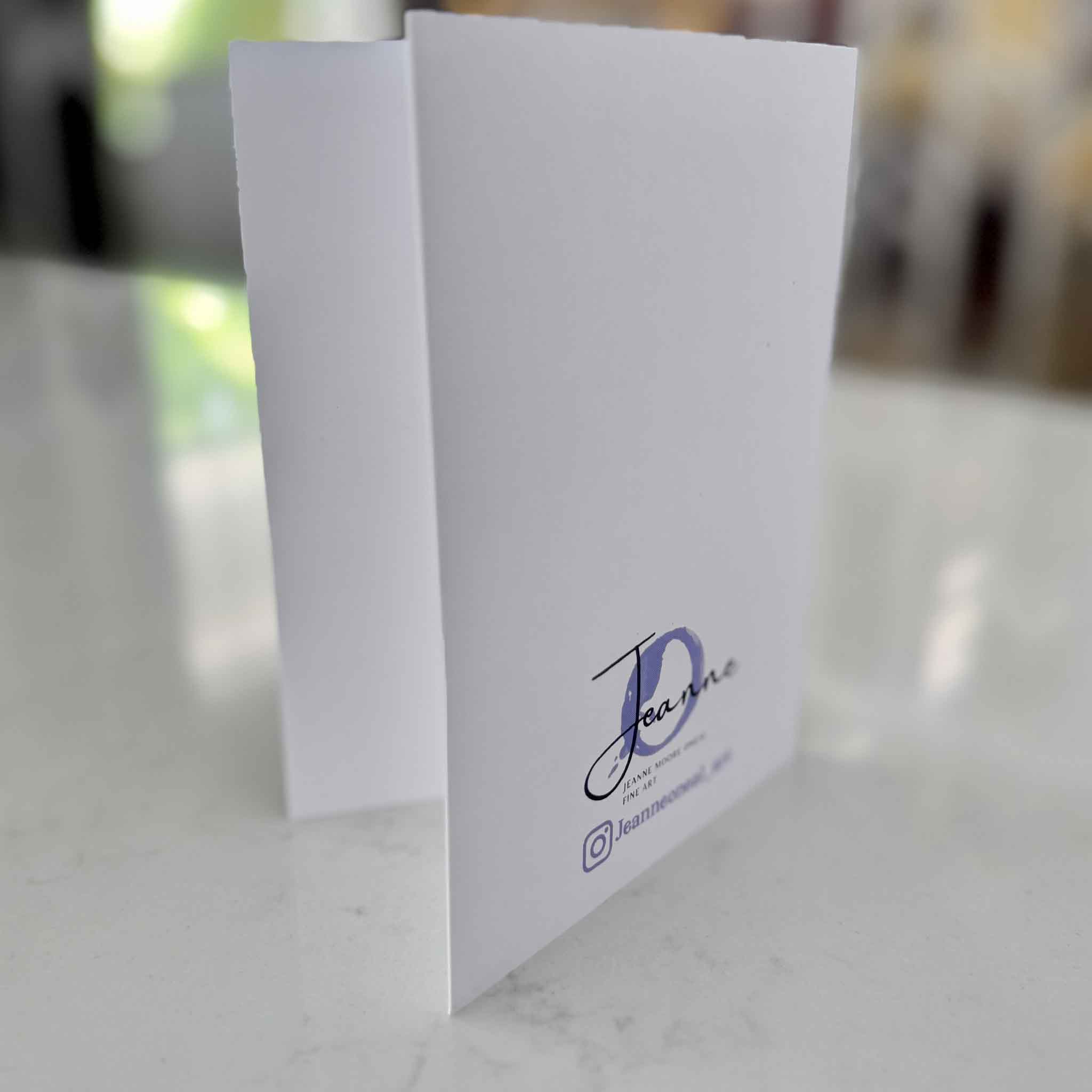 Back of a vertical notecard with artist branding by local artist Jeanne O’Neal, part of a notecard set available at Gray Man Gallery.