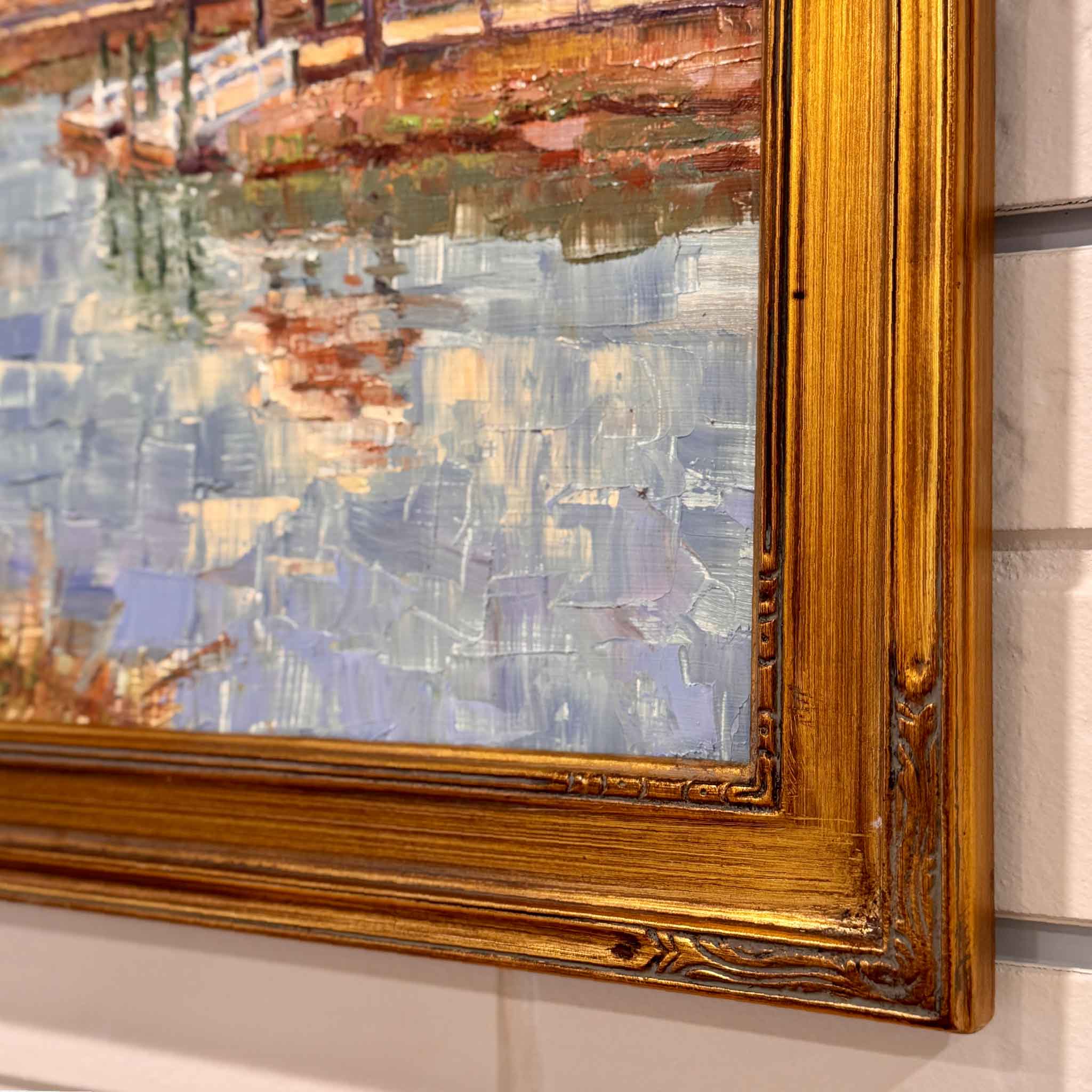 Close-up detail of Creek with Palm by local artist Michael Rogan at Gray Man Gallery, highlighting expressive oil brushwork, coastal reflections, and the antique gold frame.