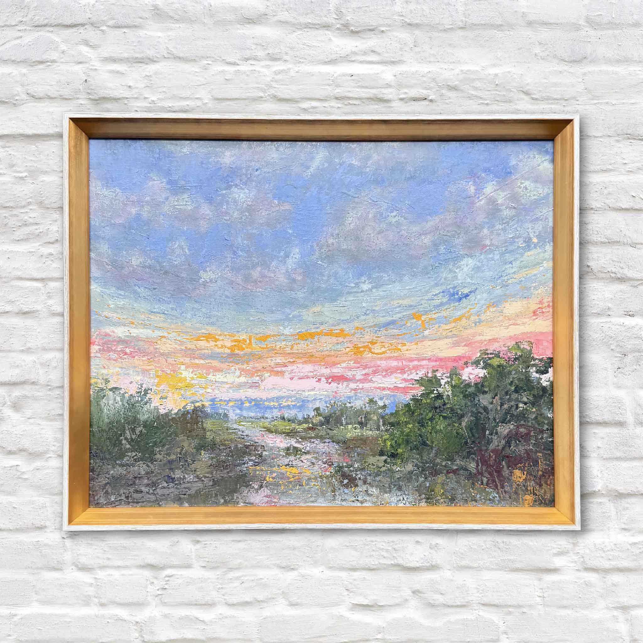 Marshlight original oil painting by local Pawleys Island artist Jeanne O’Neal, framed in signature gold slope frame and displayed at Gray Man Gallery in Pawleys Island, South Carolina, Lowcountry marsh sunset landscape artwork
