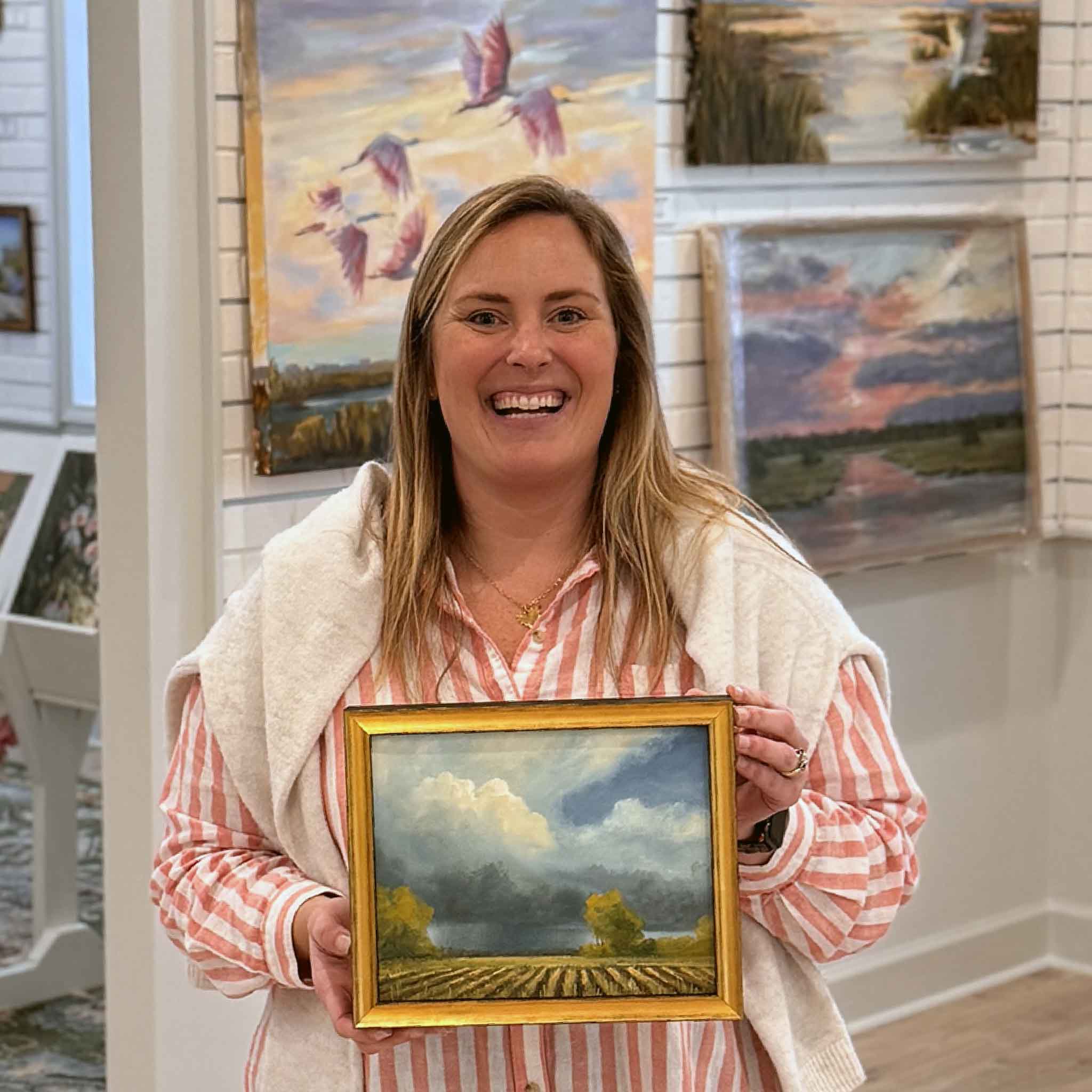 Mayfields original oil landscape painting by local favorite Jamie Arnold shown inside Gray Man Gallery in Pawleys Island, South Carolina, highlighting a moody Lowcountry sky and structured field lines in a framed Southern landscape