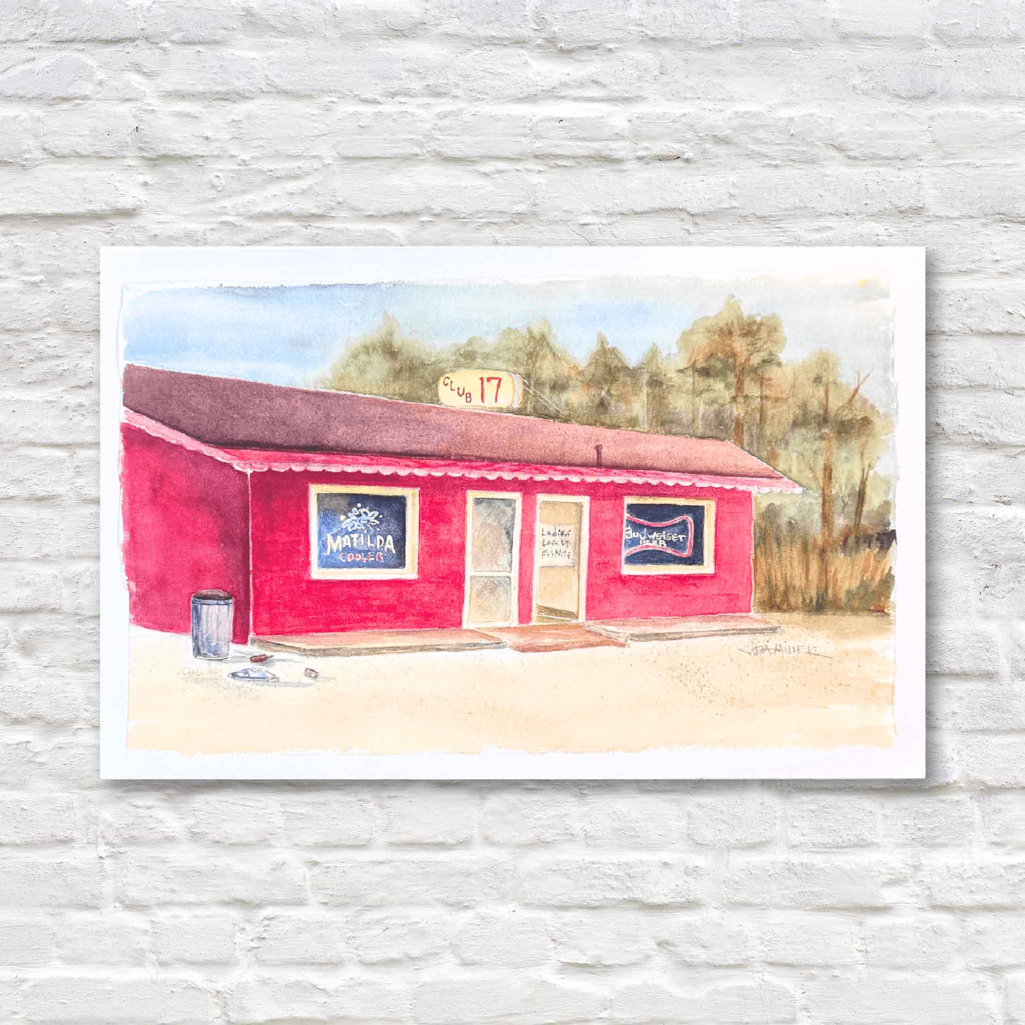 Watercolor print of Club 17 by Vida Miller, depicting the iconic red Pawleys Island roadside bar with vintage beer signs, a beloved Lowcountry landmark full of local history and character, available at Gray Man Gallery.