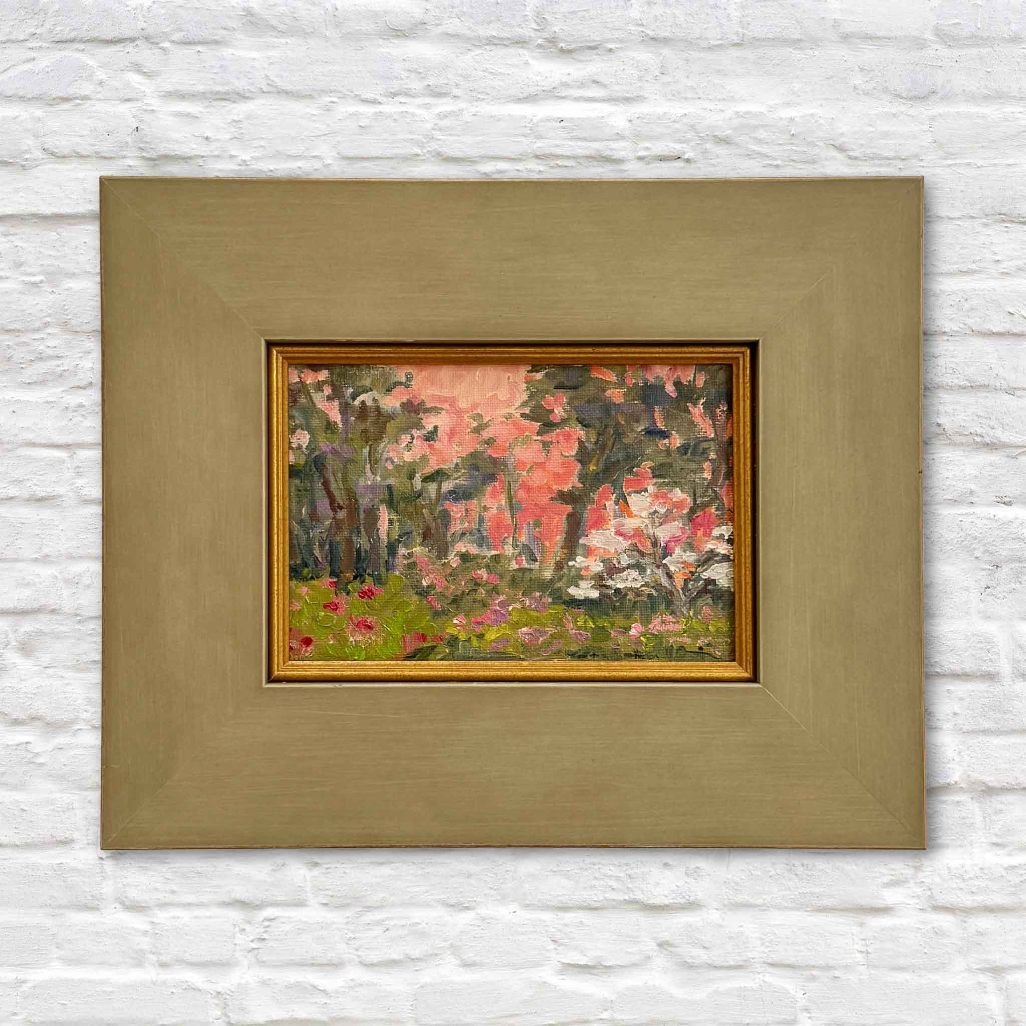 Garden at Dusk by Jeanne O’Neal original oil painting created at Brookgreen Gardens featuring pink and coral evening sky, blooming florals, and layered trees in custom frame at Gray Man Gallery Pawleys Island