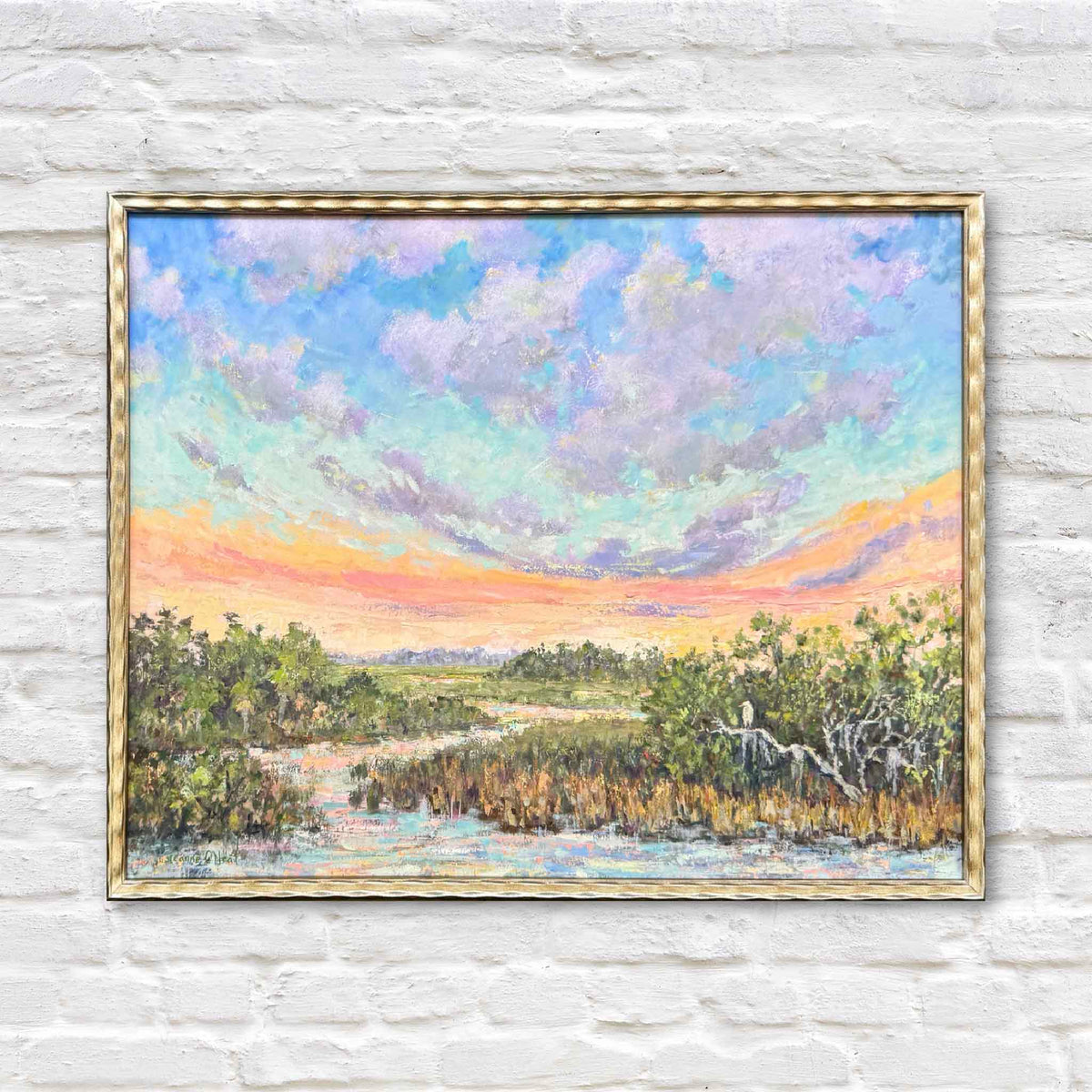 Joyful Solitude original oil painting by local artist Jeanne O’Neal featuring a South Carolina Lowcountry tidal marsh and winding creek beneath a dramatic pastel sky in turquoise, lavender, peach and gold, framed and available at Gray Man Gallery in Pawleys Island
