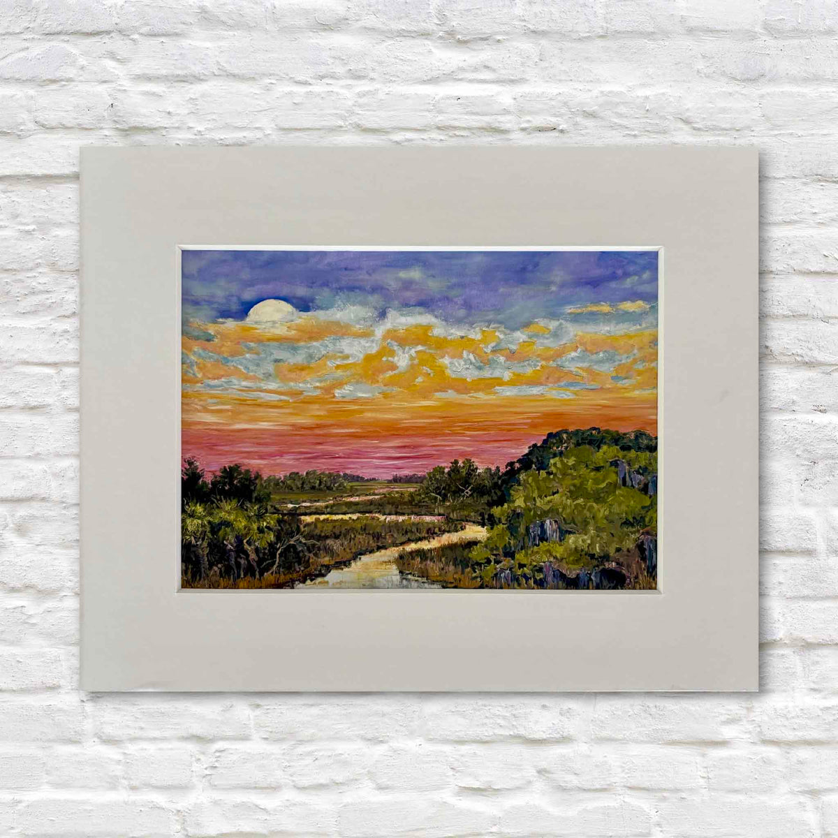 Moonrise fine art giclée print by Jeanne O’Neal featuring a colorful Lowcountry marsh at dusk with a rising moon, winding tidal creek, palmettos and a vibrant violet, gold and pink sky, available in standard frame sizes from Gray Man Gallery in Pawleys Island, South Carolina.