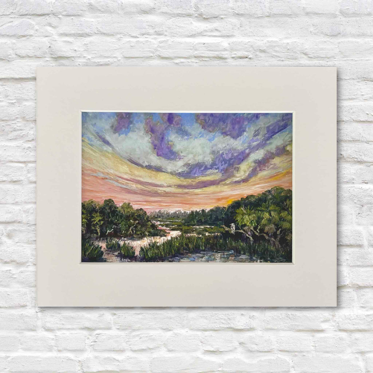 The Day Softens fine art giclée print by Jeanne O’Neal depicting a Lowcountry tidal marsh at sunset beneath a dramatic pink, violet, blue and gold sky, professionally matted to fit a standard-size frame and available at Gray Man Gallery in Pawleys Island, South Carolina.