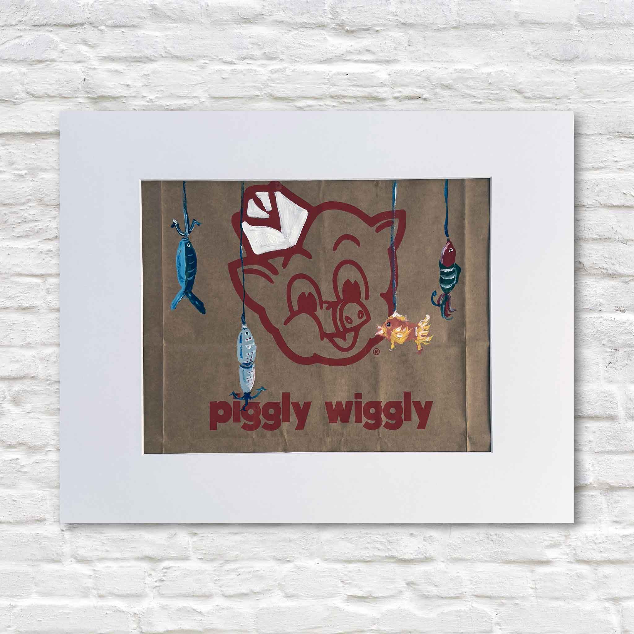 Piggly Wiggly: Fishin’ Lures by South Carolina artist Jenny Reynolds featuring hand-painted fishing lures on an authentic Piggly Wiggly paper grocery bag, professionally matted to fit a standard 16x20 frame at Gray Man Gallery