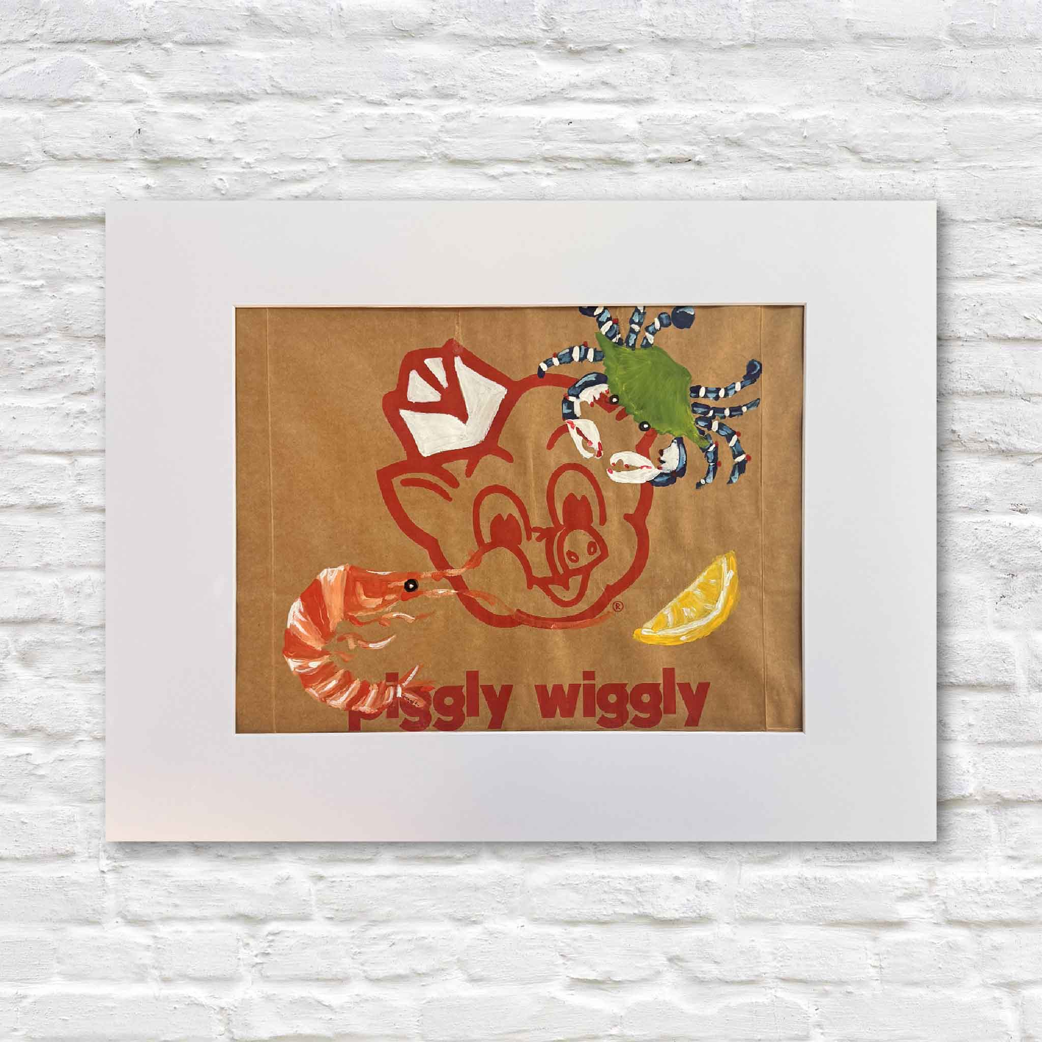Piggly Wiggly: Shrimp, Crab & Lemon, an original hand-painted artwork by local artist Jenny Reynolds, painted directly on a real Piggly Wiggly grocery bag. This playful Lowcountry piece features the iconic pig mascot with a shrimp, blue crab, and lemon slice, professionally matted to fit a standard 16x20 frame and available at Gray Man Gallery in Pawleys Island, South Carolina.