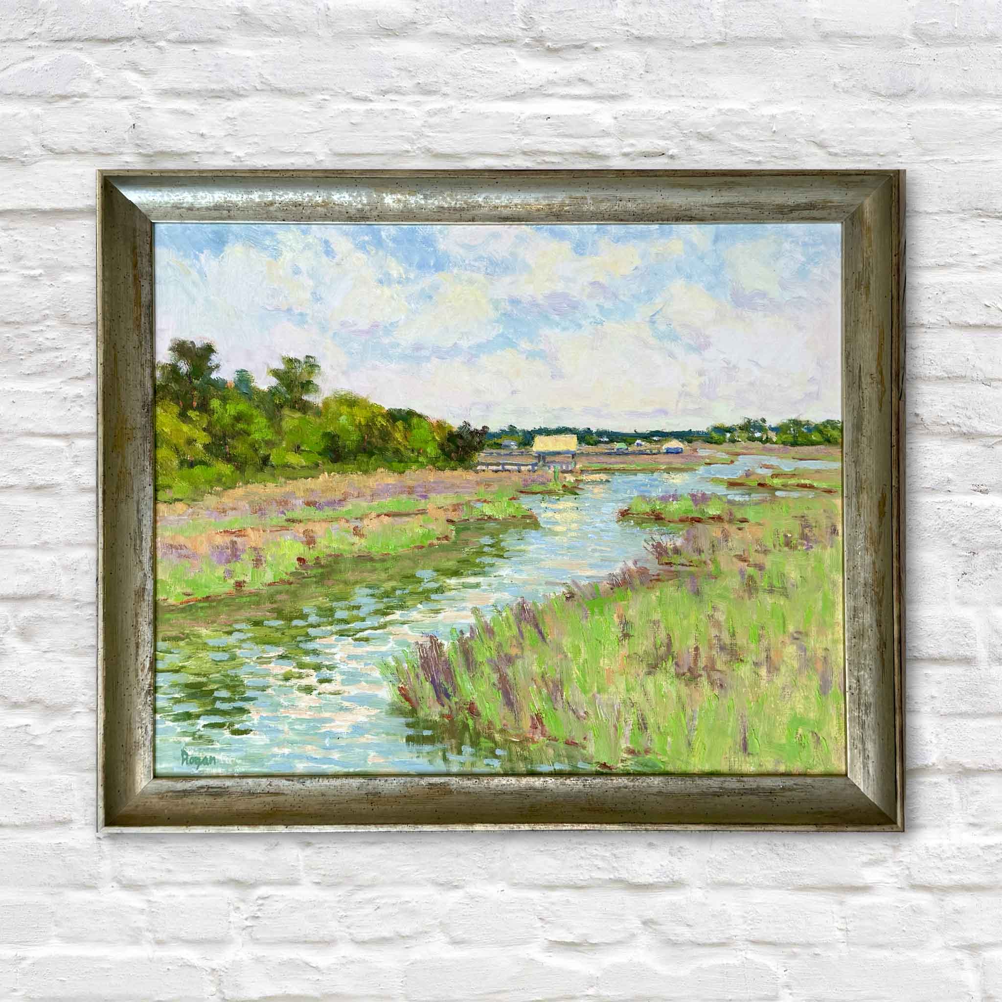 Original oil painting, Spring at Litchfield, by South Carolina artist Michael Rogan in a weathered wood frame. The impressionist Lowcountry marsh landscape features a winding tidal creek, fresh spring marsh grasses, soft blue water, and an expansive coastal sky, available at Gray Man Gallery in Pawleys Island.