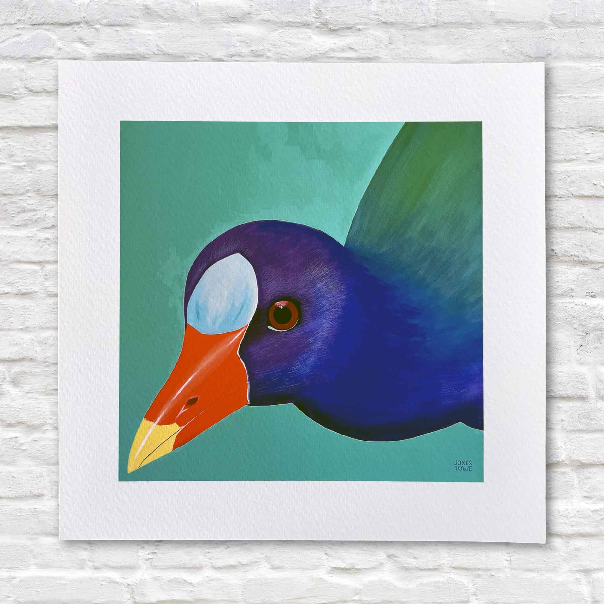 Purple Gallinule bird print by Georgetown, South Carolina local artist Nancy Jones Lowe featuring a vibrant close-up portrait of the colorful marsh bird. Professionally printed on 100% cotton archival fine art paper with archival pigment inks in an 8×8 size that fits any standard 8×8 frame, available at Gray Man Gallery in Pawleys Island.
