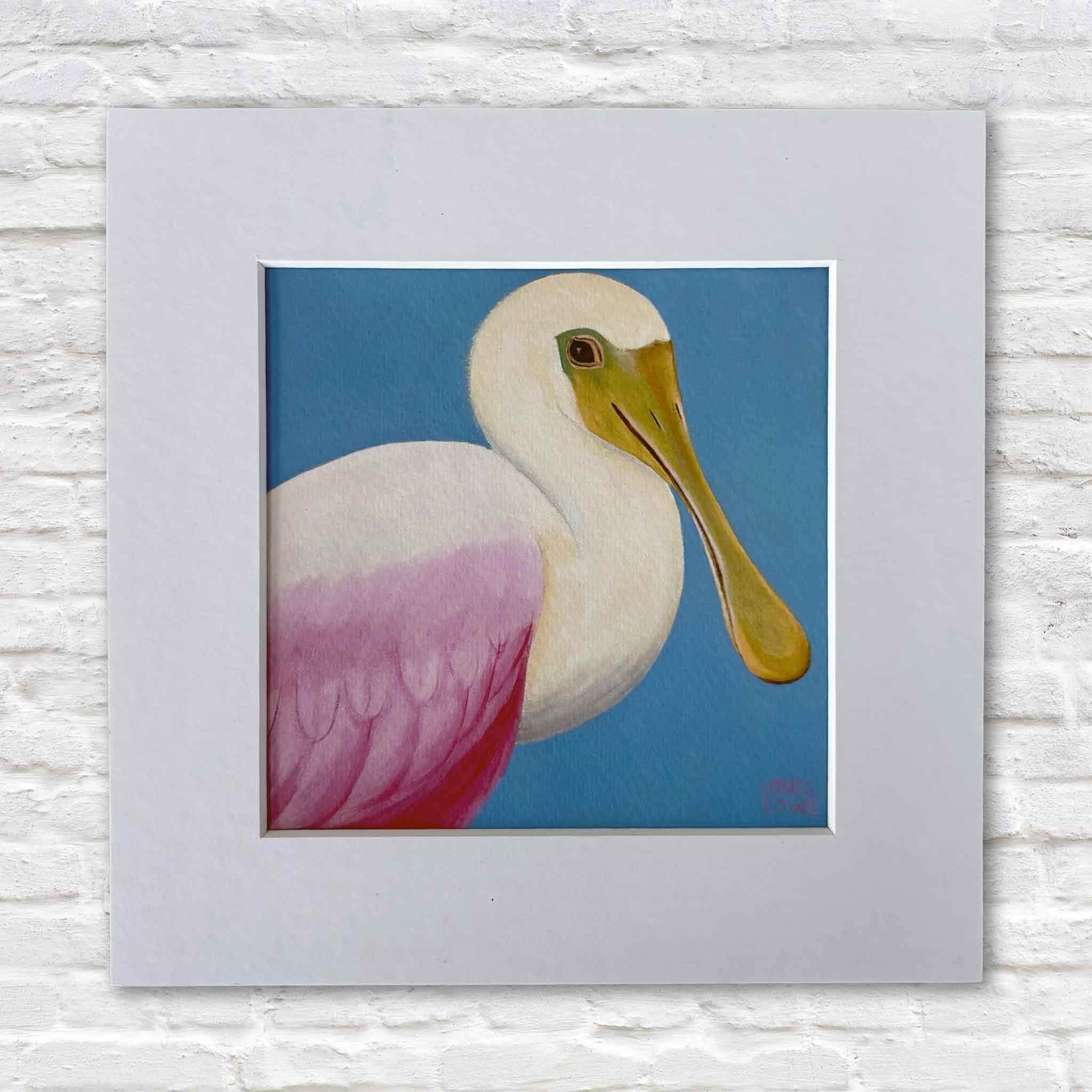 Nancy Jones Lowe's Roseate Spoonbill bird print by Georgetown, South Carolina local artist Nancy Jones Lowe, professionally printed on 100% cotton archival fine art paper and matted to fit a standard 8×8 frame, available at Gray Man Gallery in Pawleys Island.