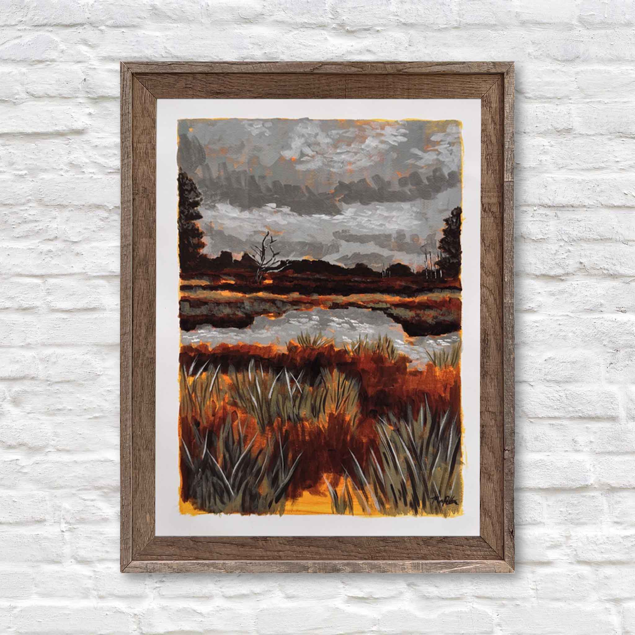 “Oyster Landing Basin” fine art print by local Lowcountry artist Maggie Pelton displayed in a ready-made frame from Gray Man Gallery in Pawleys Island, South Carolina, showing how this 18x24 coastal marsh landscape print can be easily framed without custom framing and styled for home or office décor