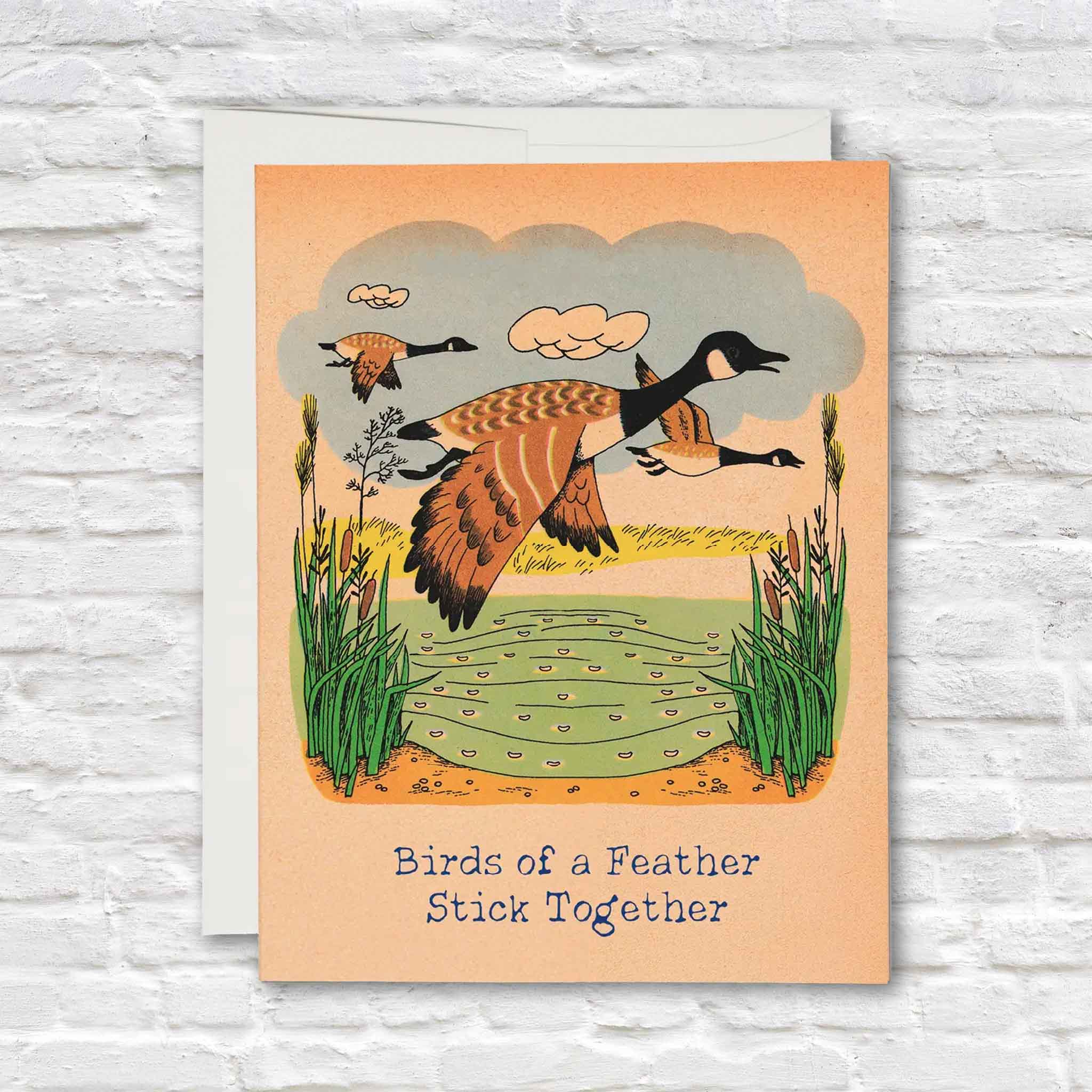 Richard Scarry Birds of a Feather greeting card featuring vintage illustrated geese flying over a marsh and the message “Birds of a Feather Stick Together,” available at Gray Man Gallery in Pawleys Island.