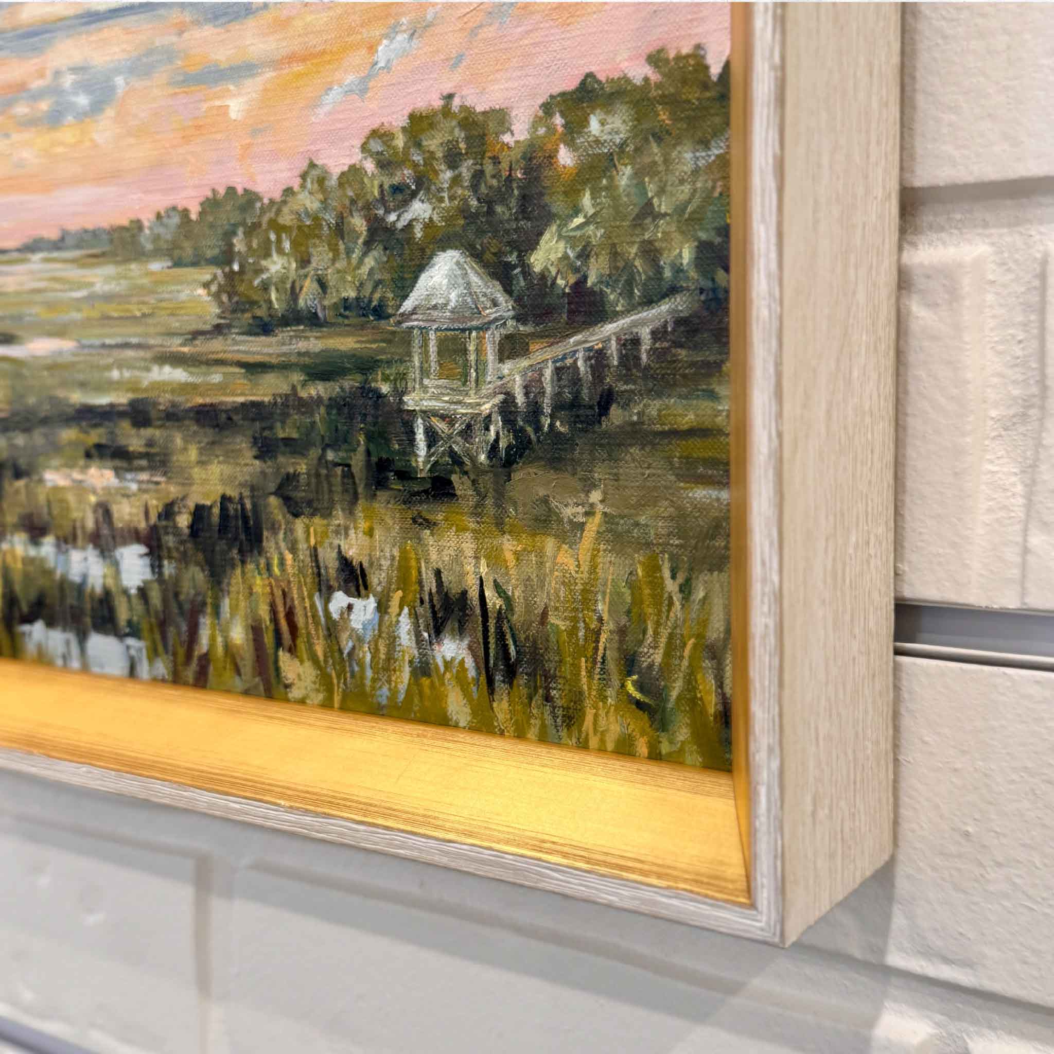 Close-up detail of “Salt + Light #3” by Jeanne O’Neal showing layered oil brushwork, marsh grasses, water reflections, and warm gold frame at Gray Man Gallery