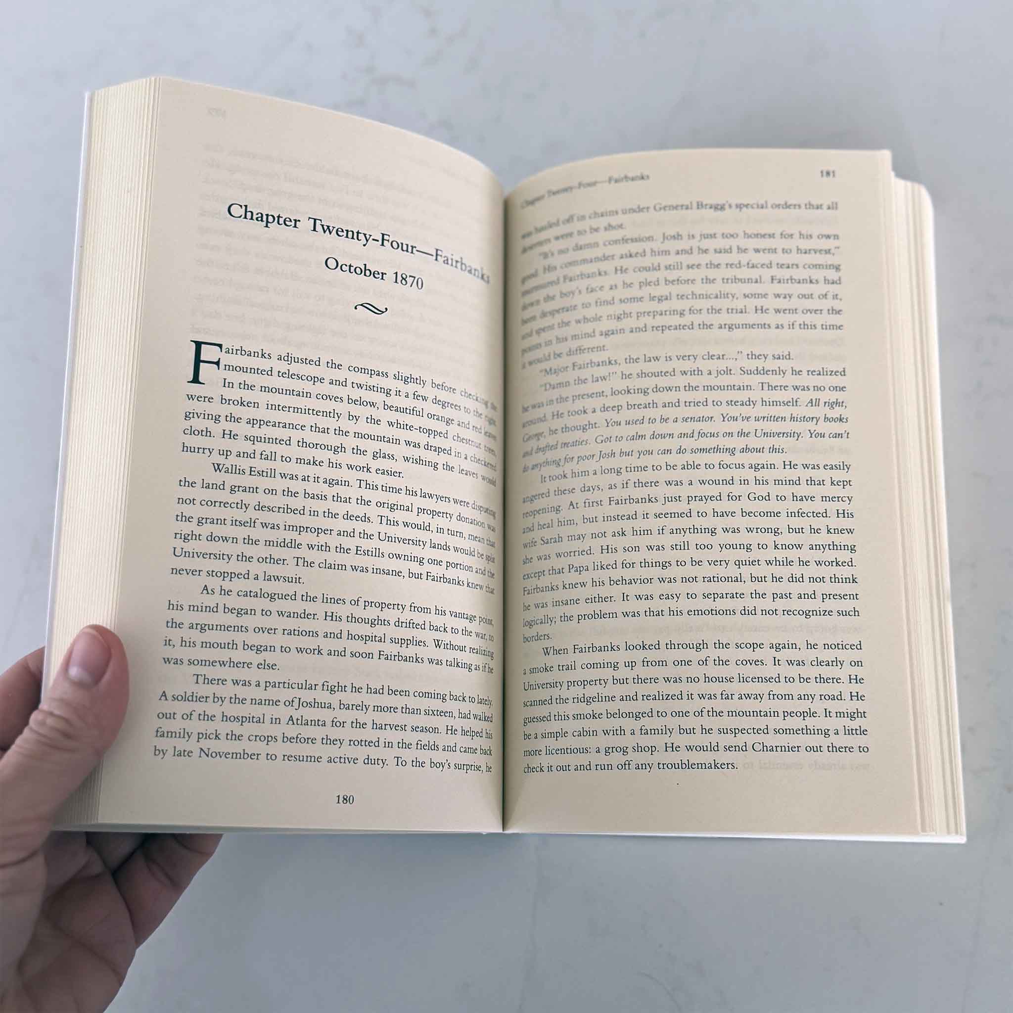 Interior pages of These Hallowed Halls by local author Kirk Battle, showing chapter text from the historical novel set in Sewanee during the post–Civil War era, photographed for Gray Man Gallery.