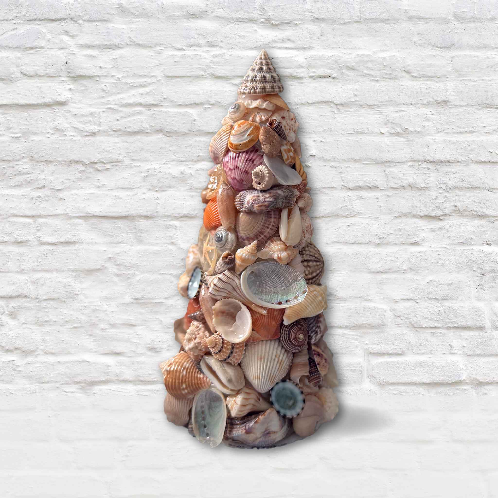 Large shell Christmas tree crafted from over 1,000 seashells by Pawleys Island artist Tootsie Watkins.