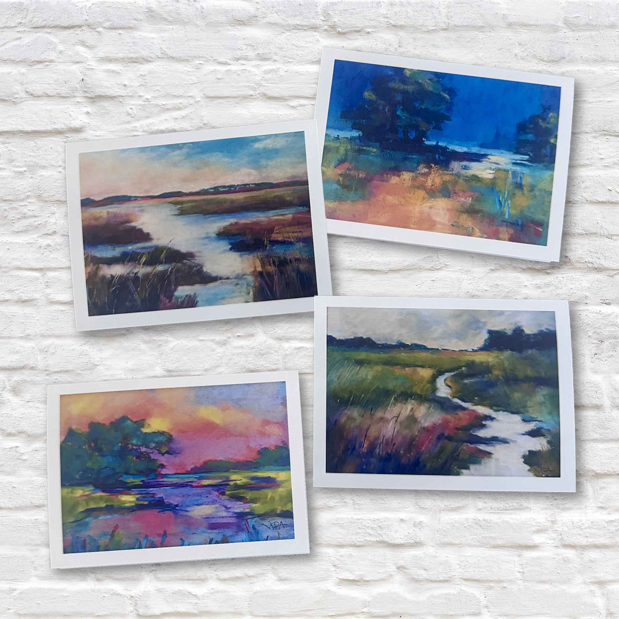 Complete collection of four folded Lowcountry notecards by Pawleys Island artist Vida Miller featuring colorful marsh sunsets, winding tidal creeks, reflective coastal waterways, and expressive South Carolina landscapes. Boxed stationery set available at Gray Man Gallery in Pawleys Island.