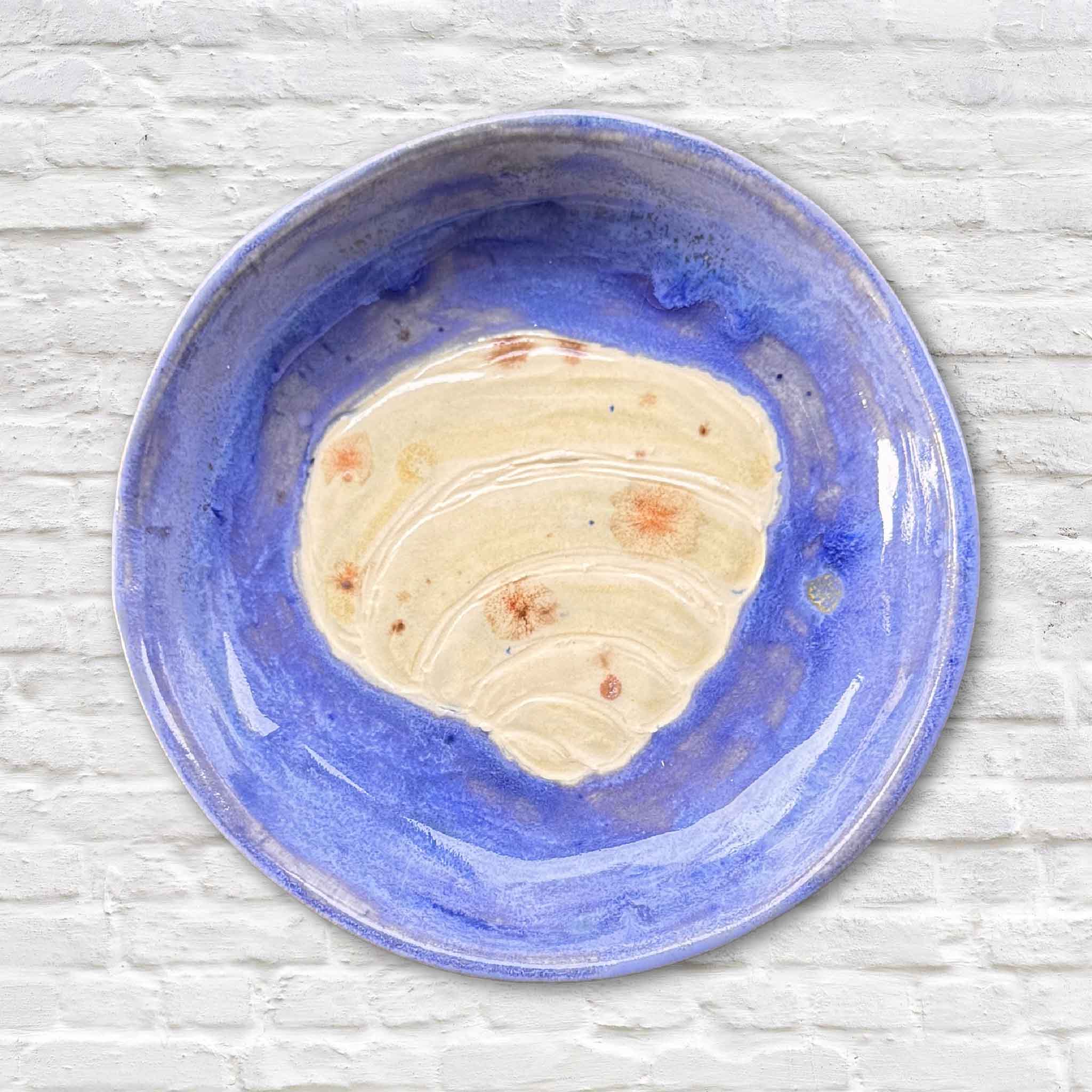 Pawleys Island Shell Dish – Delft Blue by Vida Miller, handmade ceramic dish with bright blue glaze and carved shell centerpiece, exclusive coastal pottery at Gray Man Gallery in Pawleys Island South Carolina