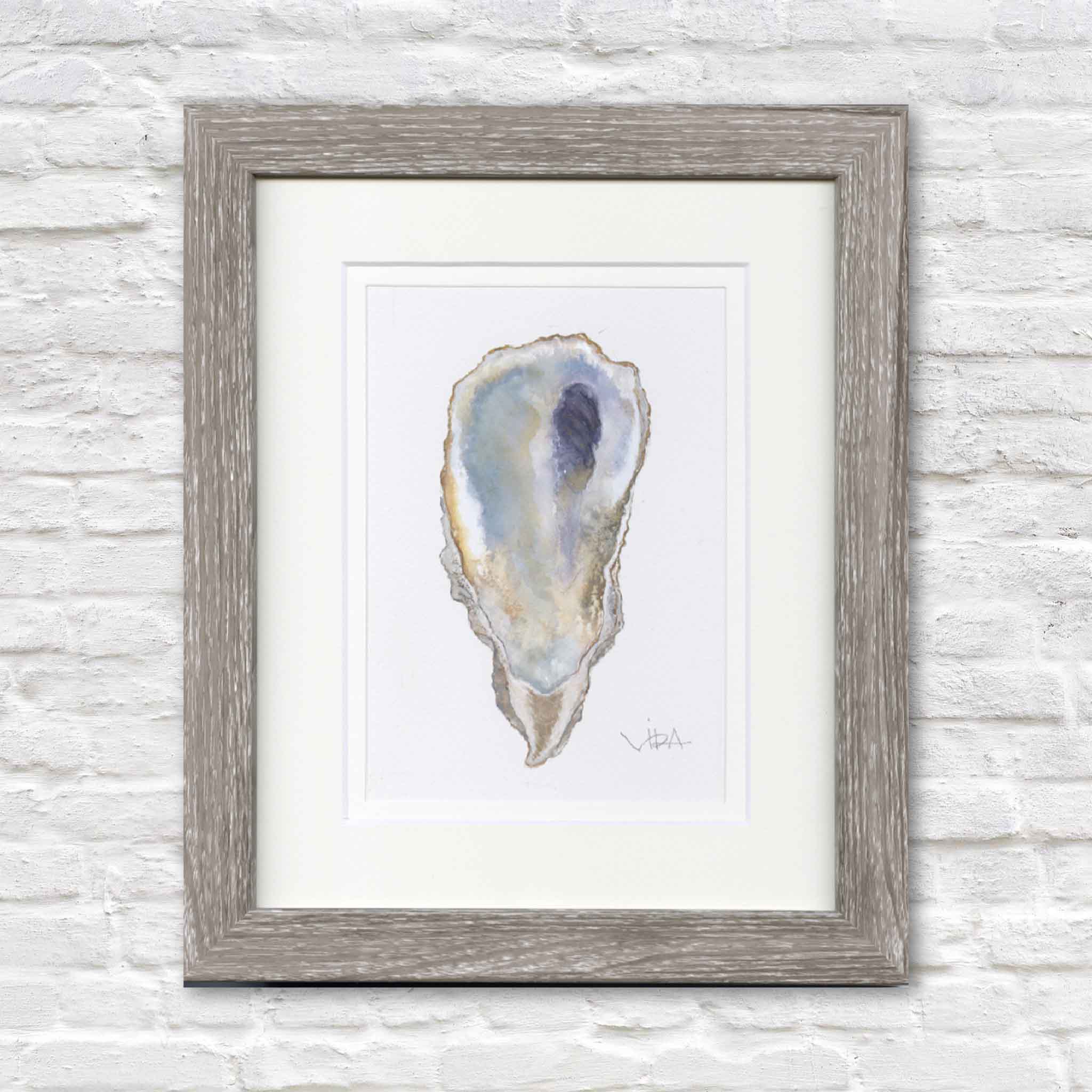 Original watercolor painting, Pawleys Oyster Shell VII by Pawleys Island artist Vida Miller, professionally double matted and framed in a weathered gray wood frame. This original oyster shell is rendered with delicate blue-gray washes, creamy ivory tones, warm sandy highlights, and a deep violet interior, celebrating the natural beauty of shells found along the South Carolina coast.